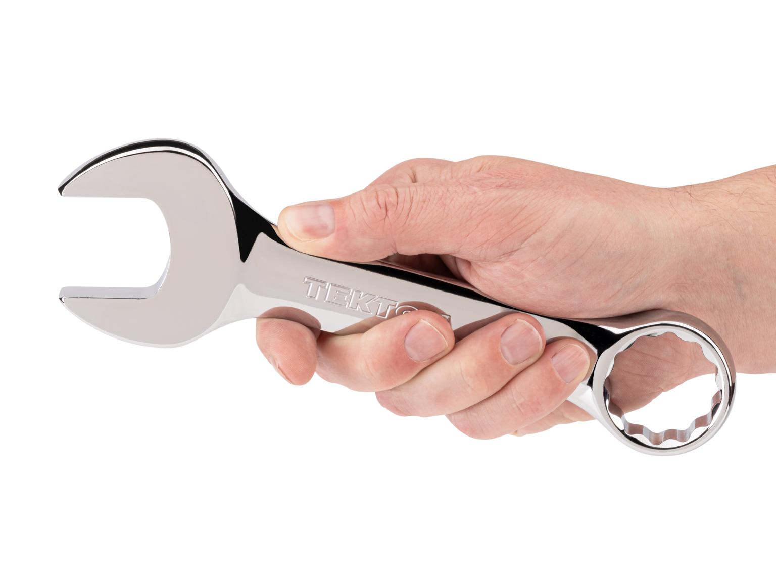Person holding Tekton combination wrench. Item #18059