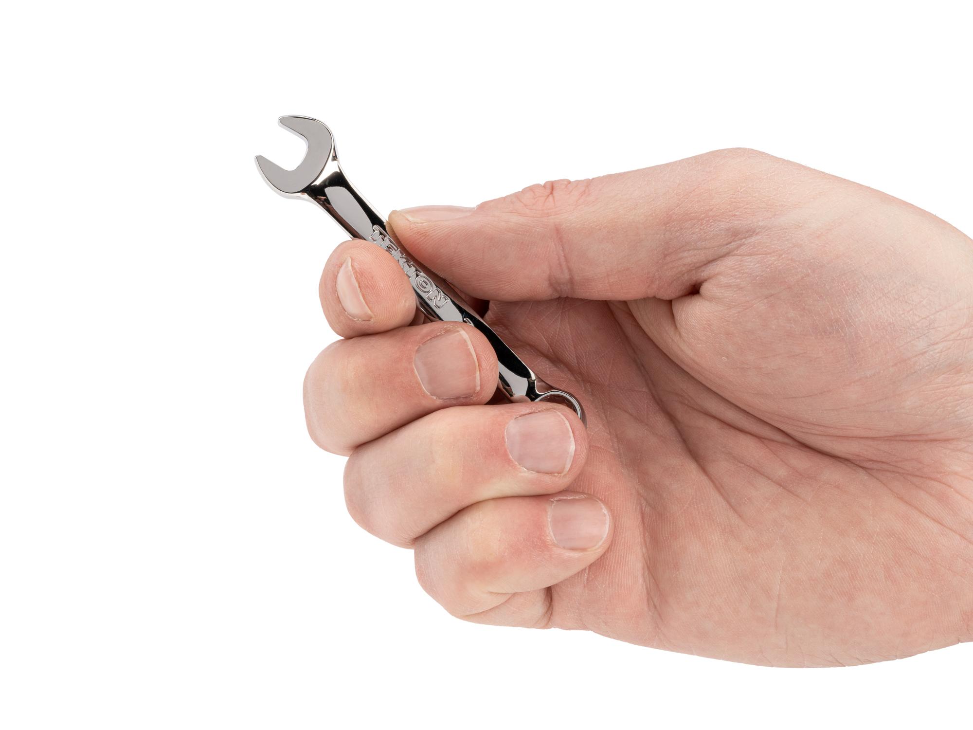 Person holding Tekton combination wrench. Item #18062