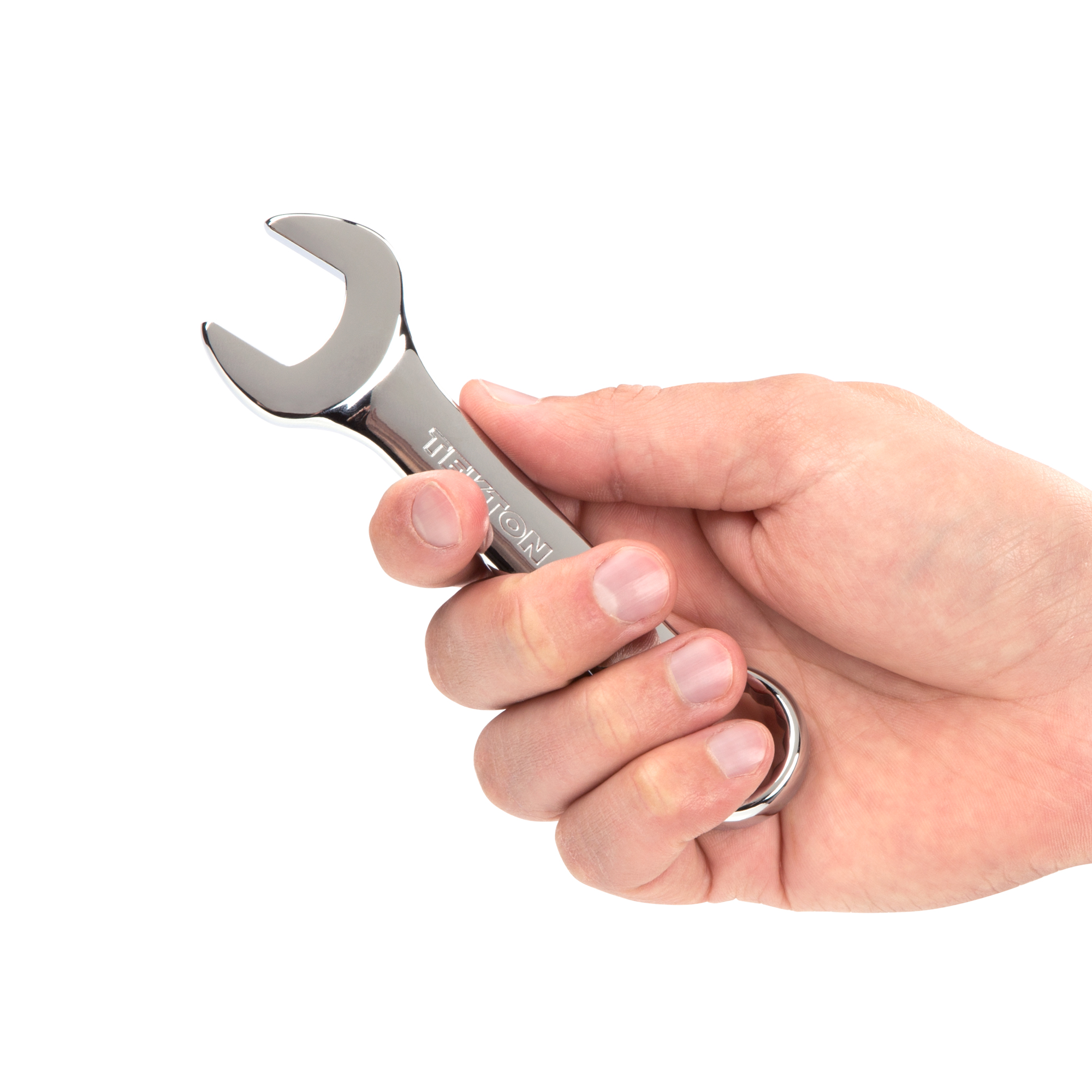 Person holding  Tekton 19 millimeter combination wrench