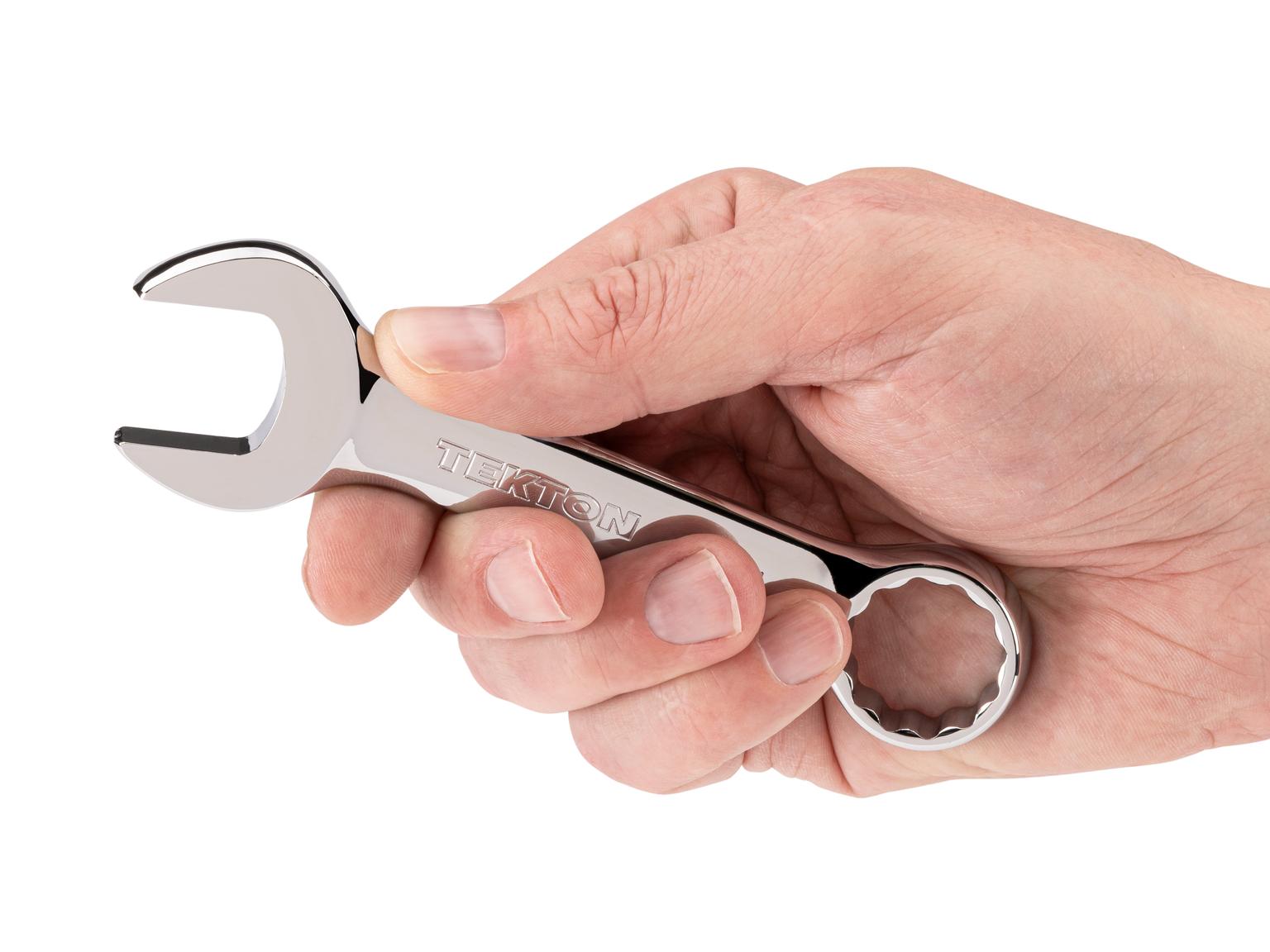 Person holding Tekton combination wrench. Item #18076