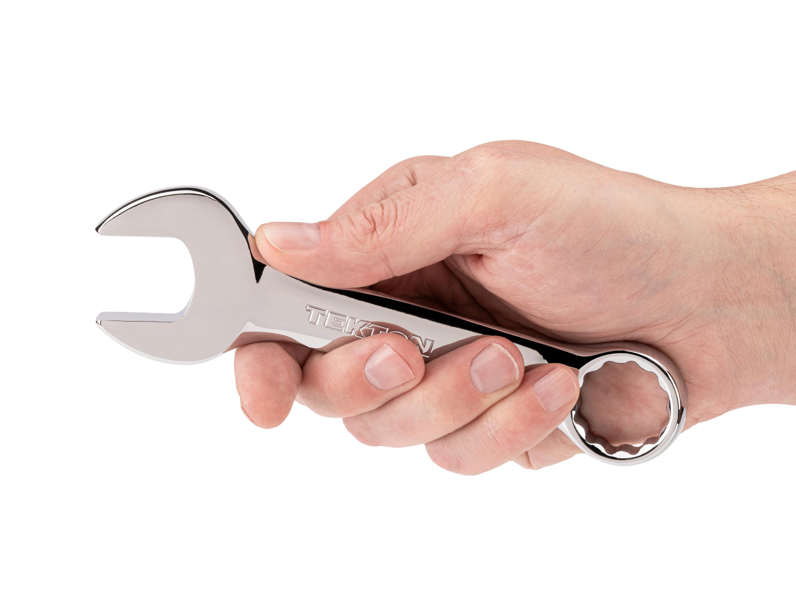 Person holding Tekton combination wrench. Item #18079