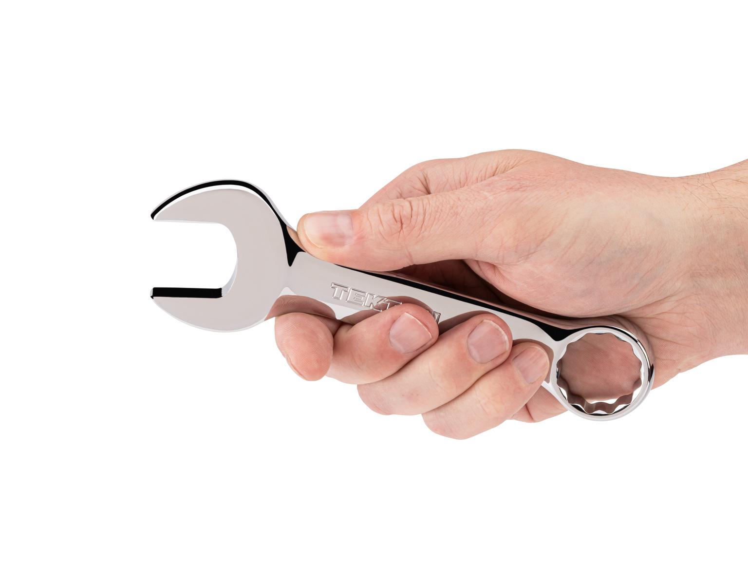 Person holding Tekton combination wrench. Item #18080
