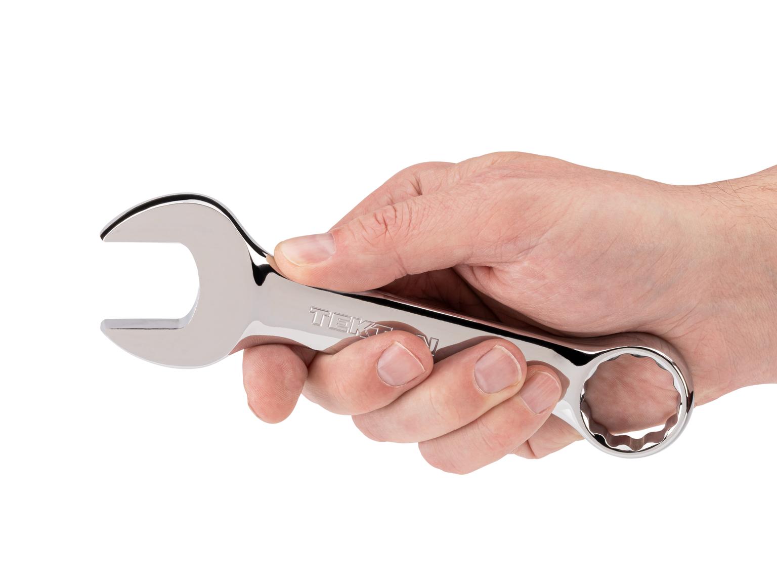 Person holding Tekton combination wrench. Item #18081