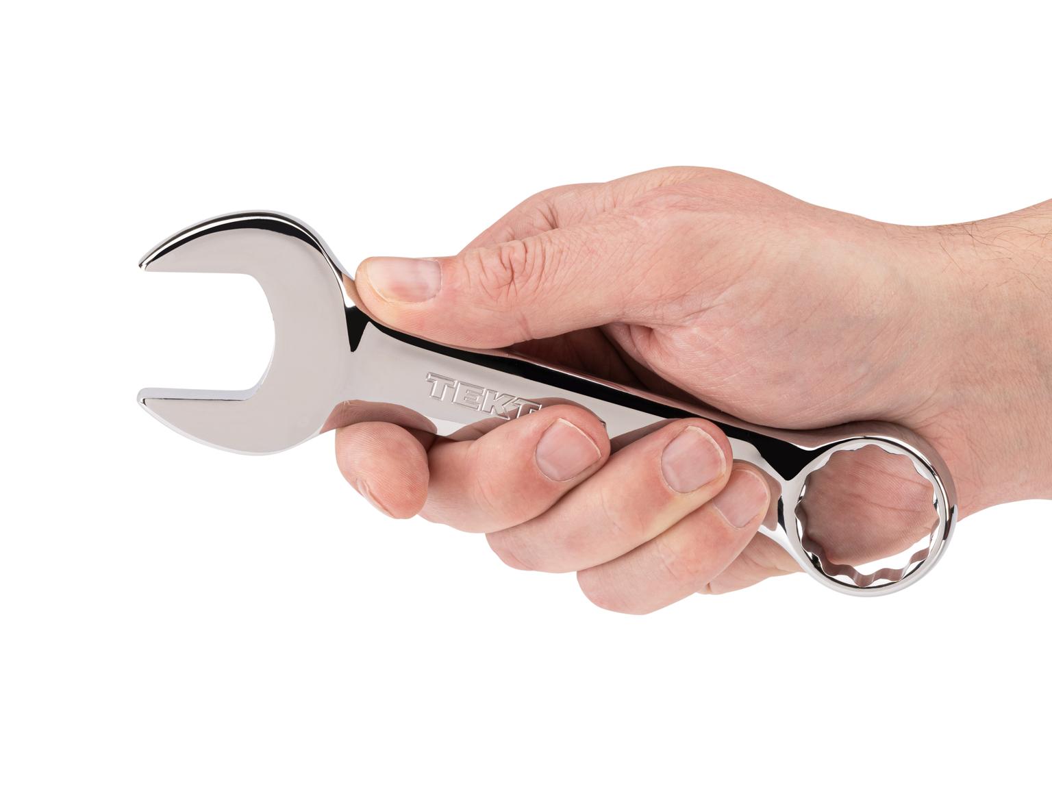 Person holding Tekton combination wrench. Item #18082