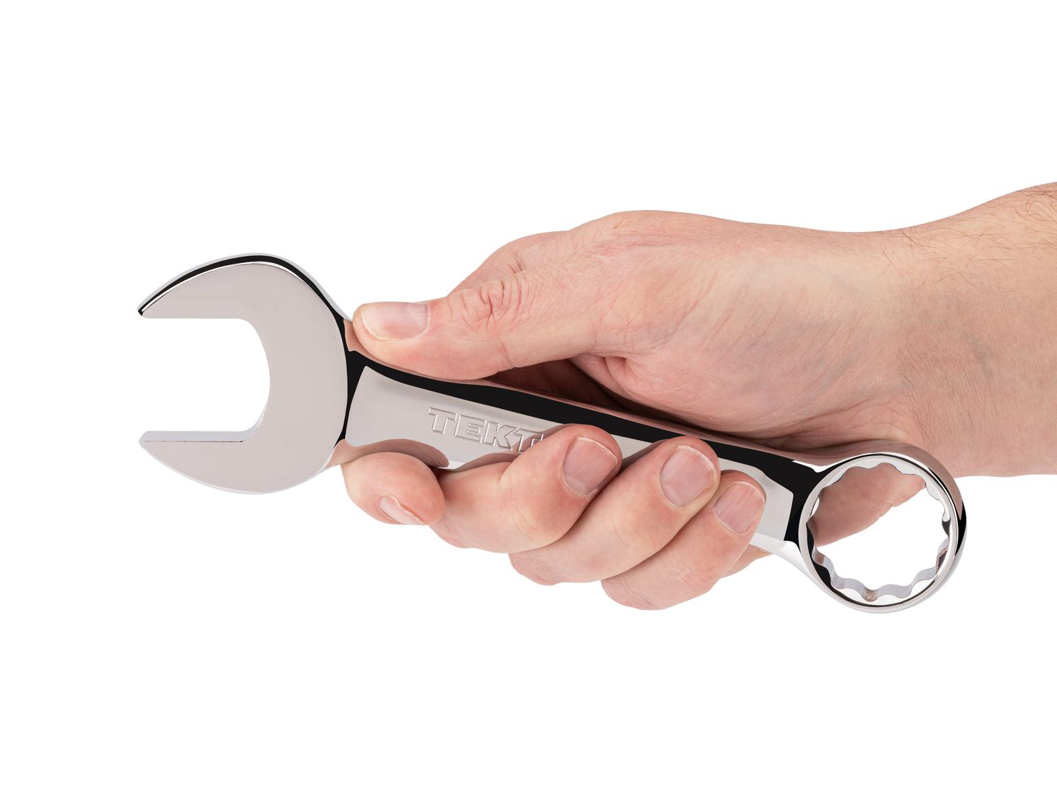 Person holding Tekton combination wrench. Item #18084