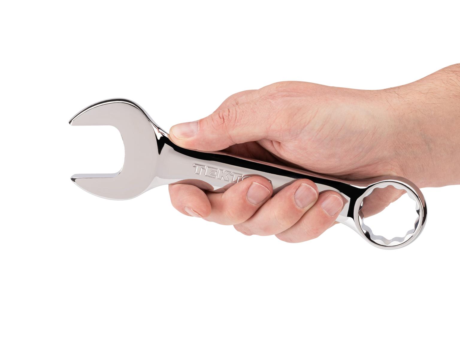 Person holding Tekton combination wrench. Item #18085