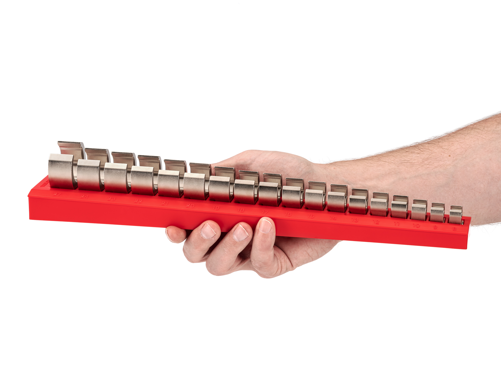 Person Holding 18-piece metric crowfoot wrench set in a red rack