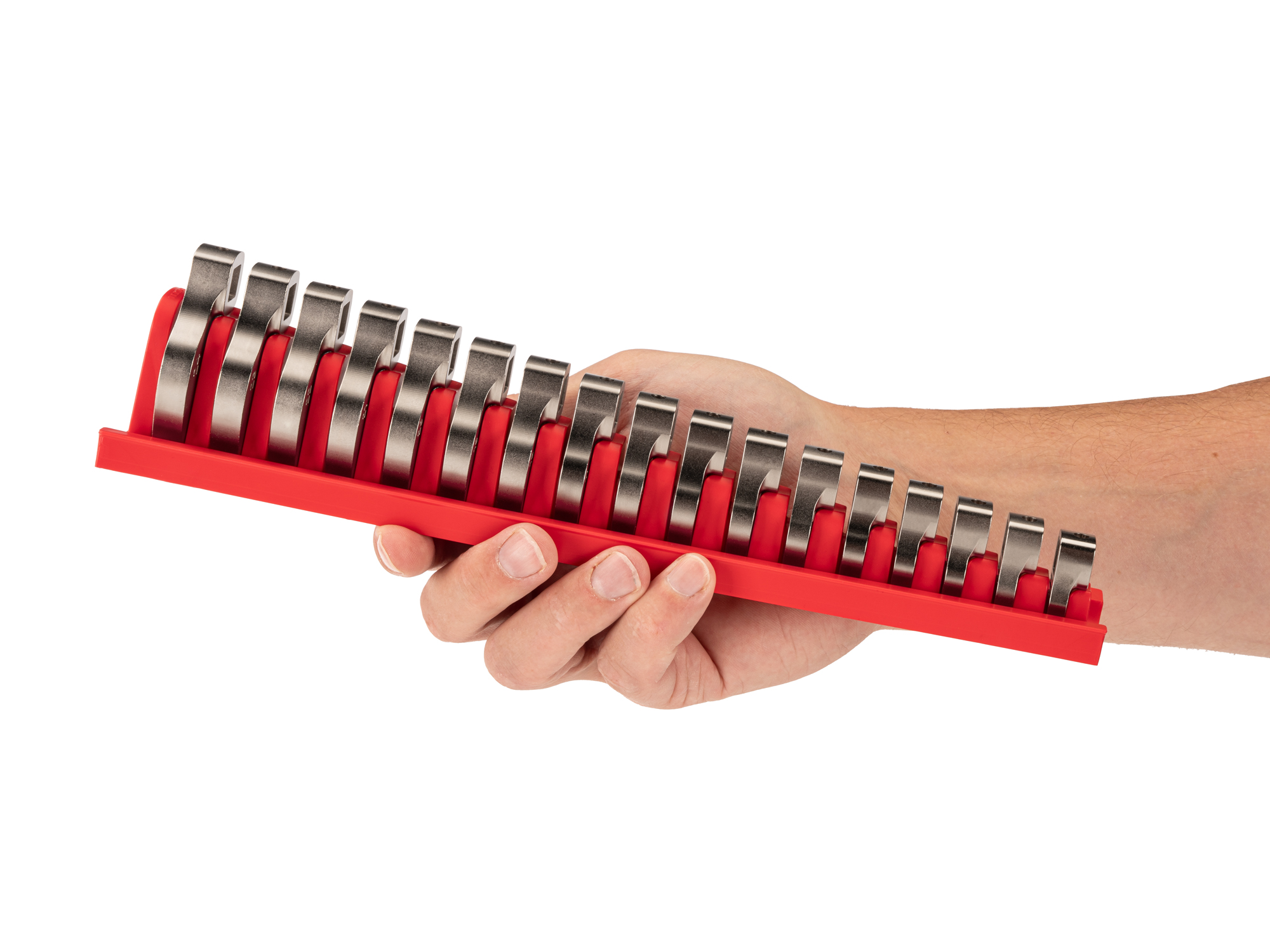 Person Holding 17-piece metric crowfoot wrench set in a red rack