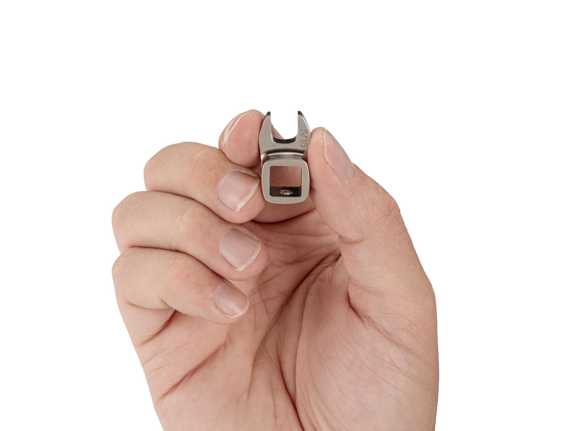 Person holding Tekton crowfoot wrench. Item #WCF13108