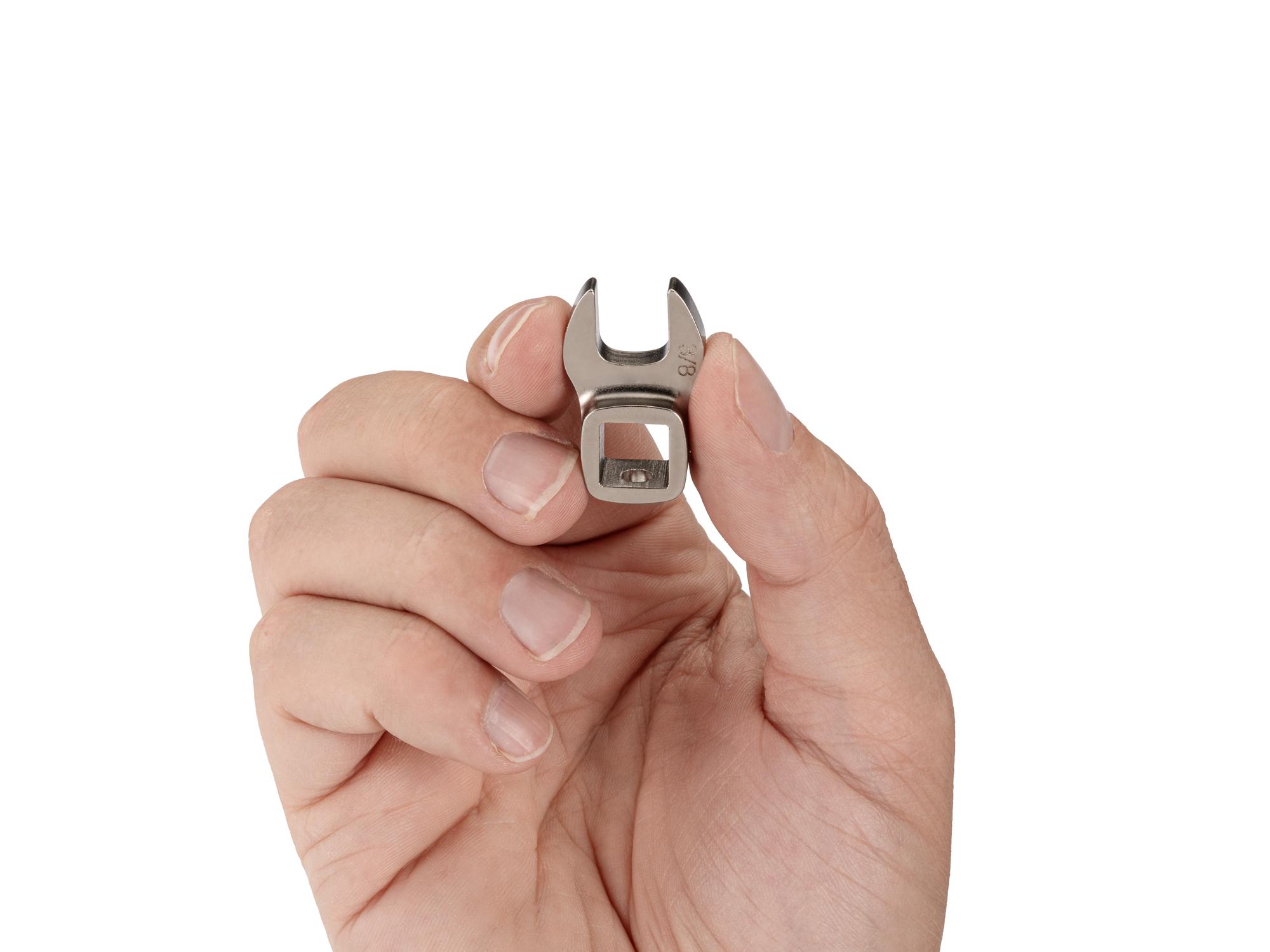 Person holding Tekton crowfoot wrench. Item #WCF13110
