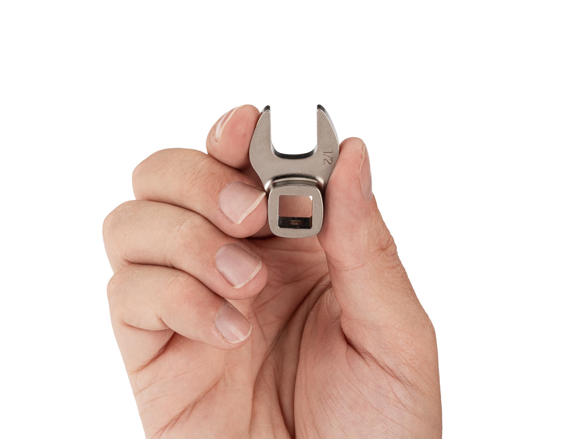 Person holding Tekton crowfoot wrench. Item #WCF13113