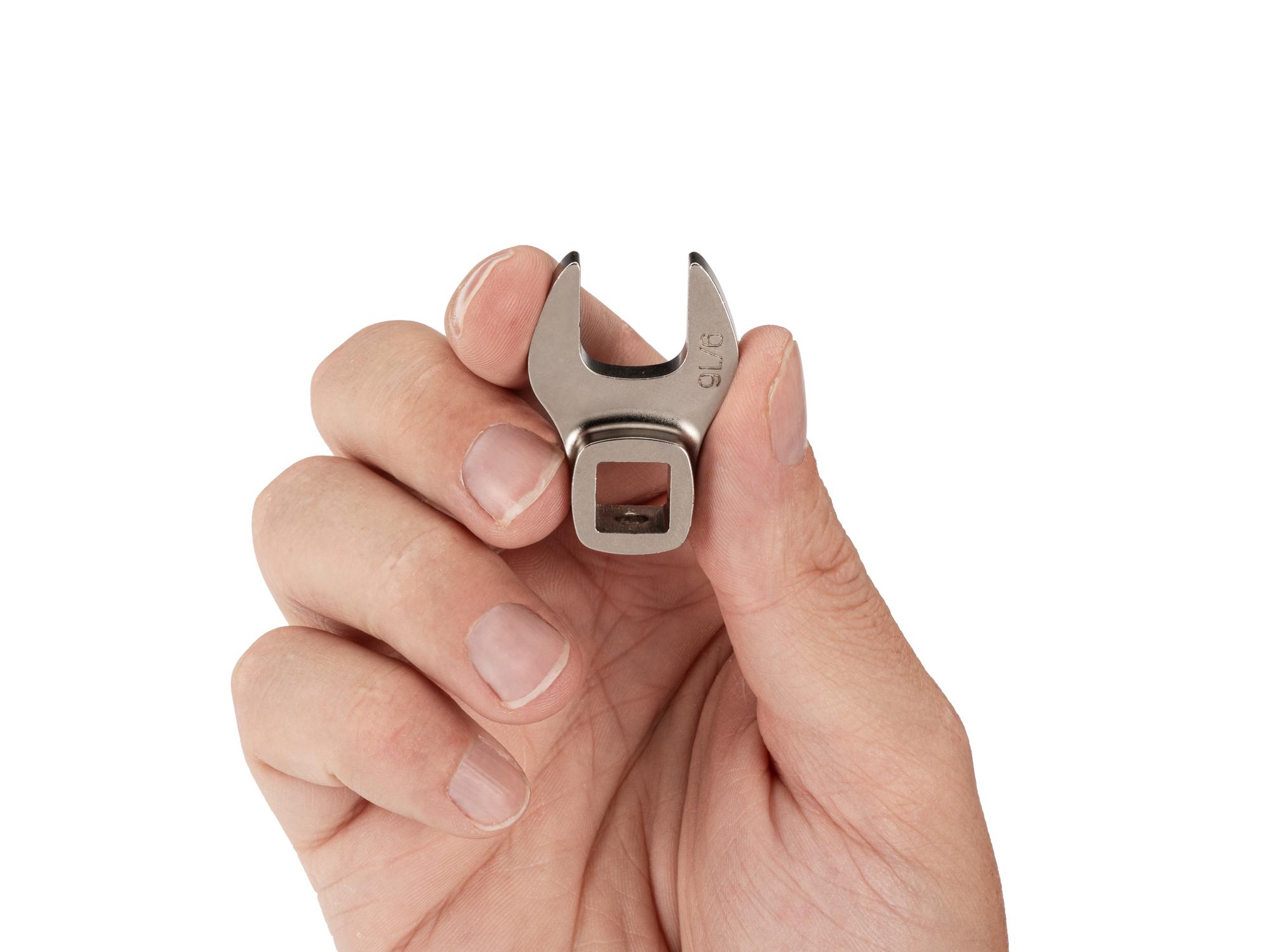 Person holding Tekton crowfoot wrench. Item #WCF13114