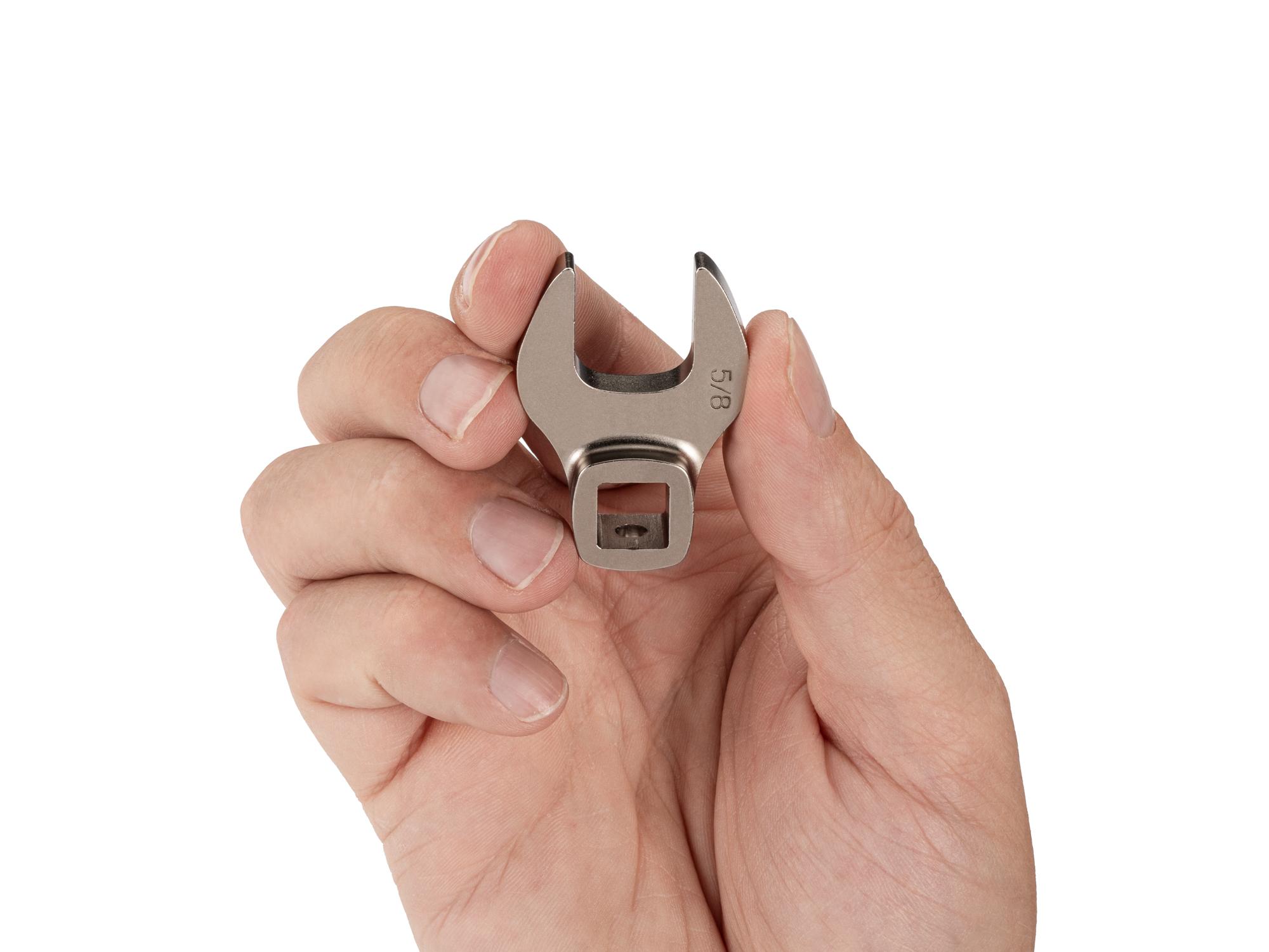 Person holding Tekton crowfoot wrench. Item #WCF13116