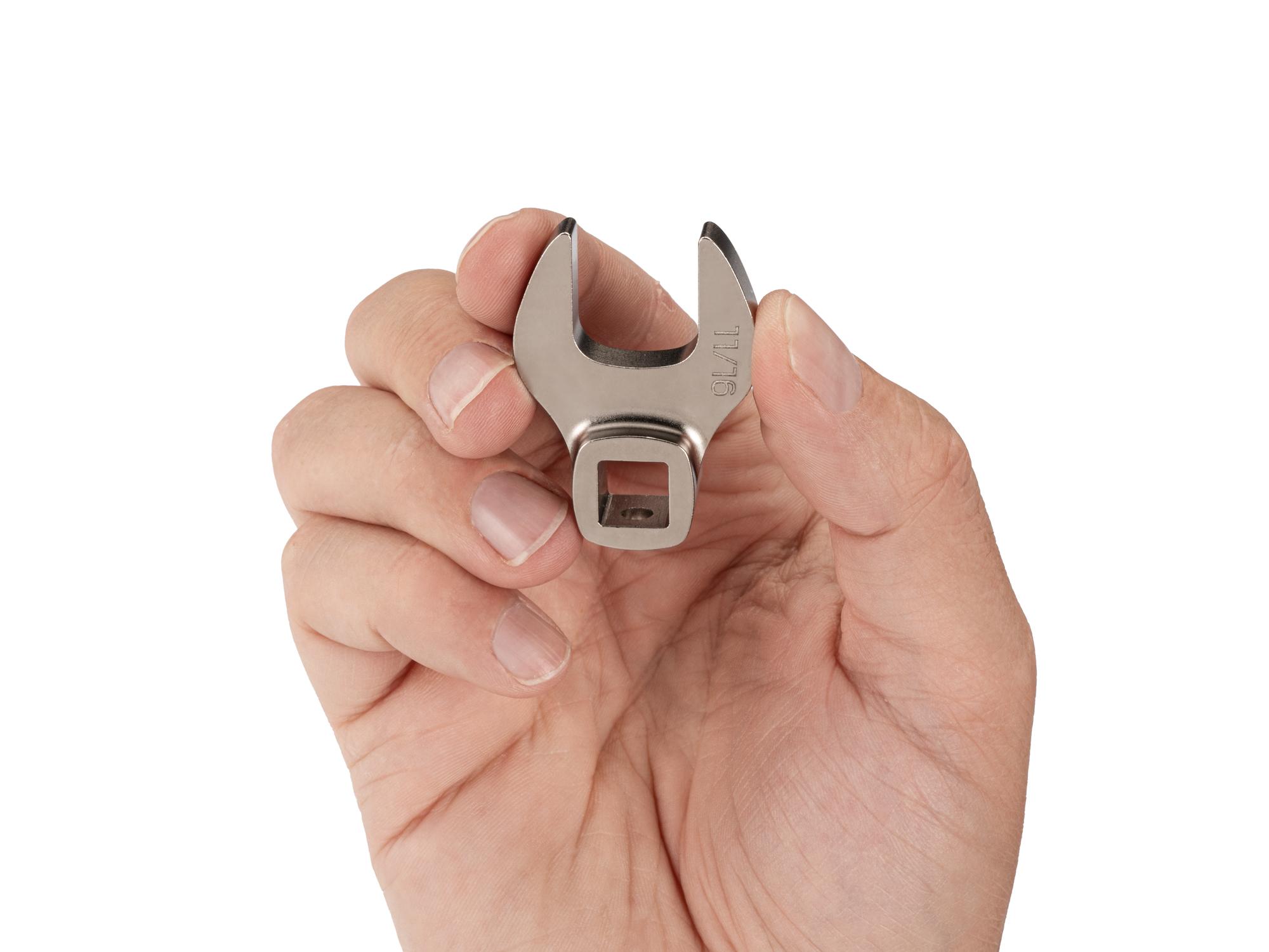 Person holding Tekton crowfoot wrench. Item #WCF13117
