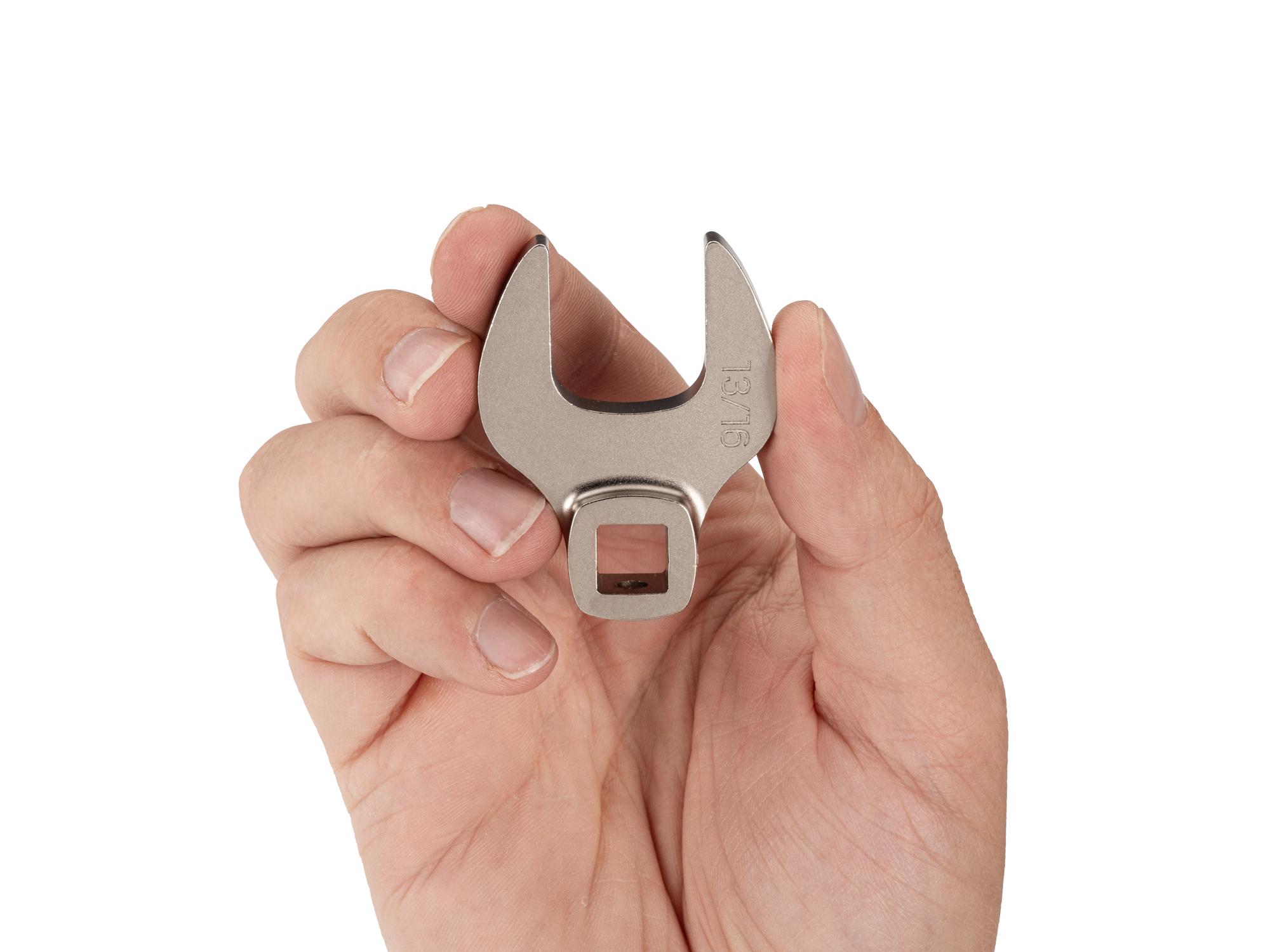 Person holding Tekton crowfoot wrench. Item #WCF13121