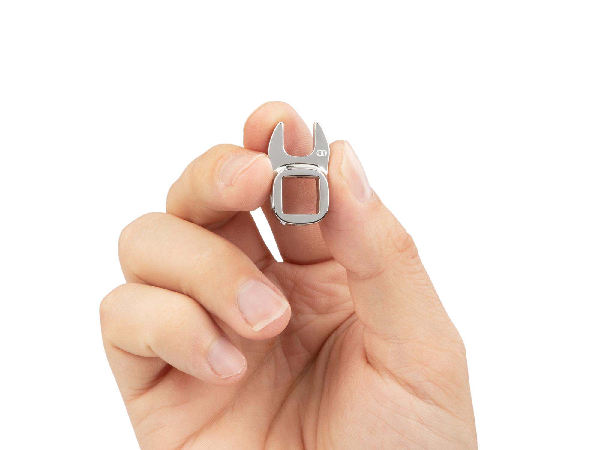 Person holding Tekton crowfoot wrench. Item #WCF14008