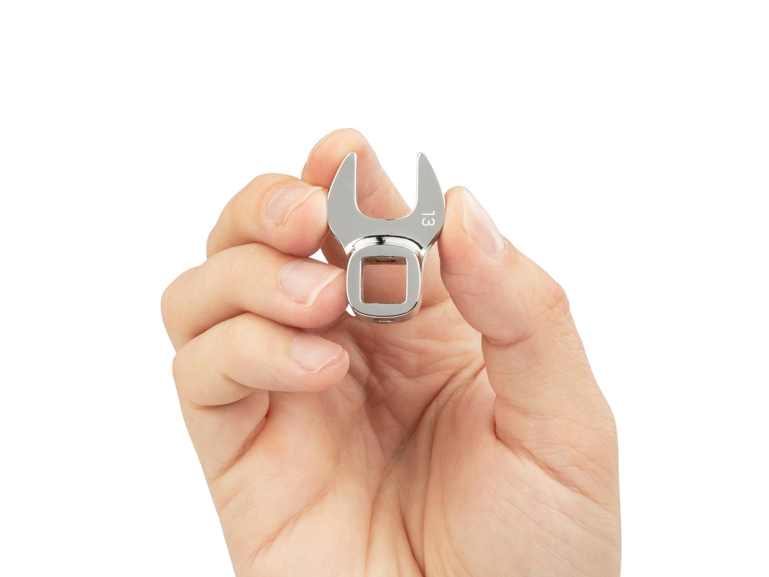 Person holding Tekton crowfoot wrench. Item #WCF14013