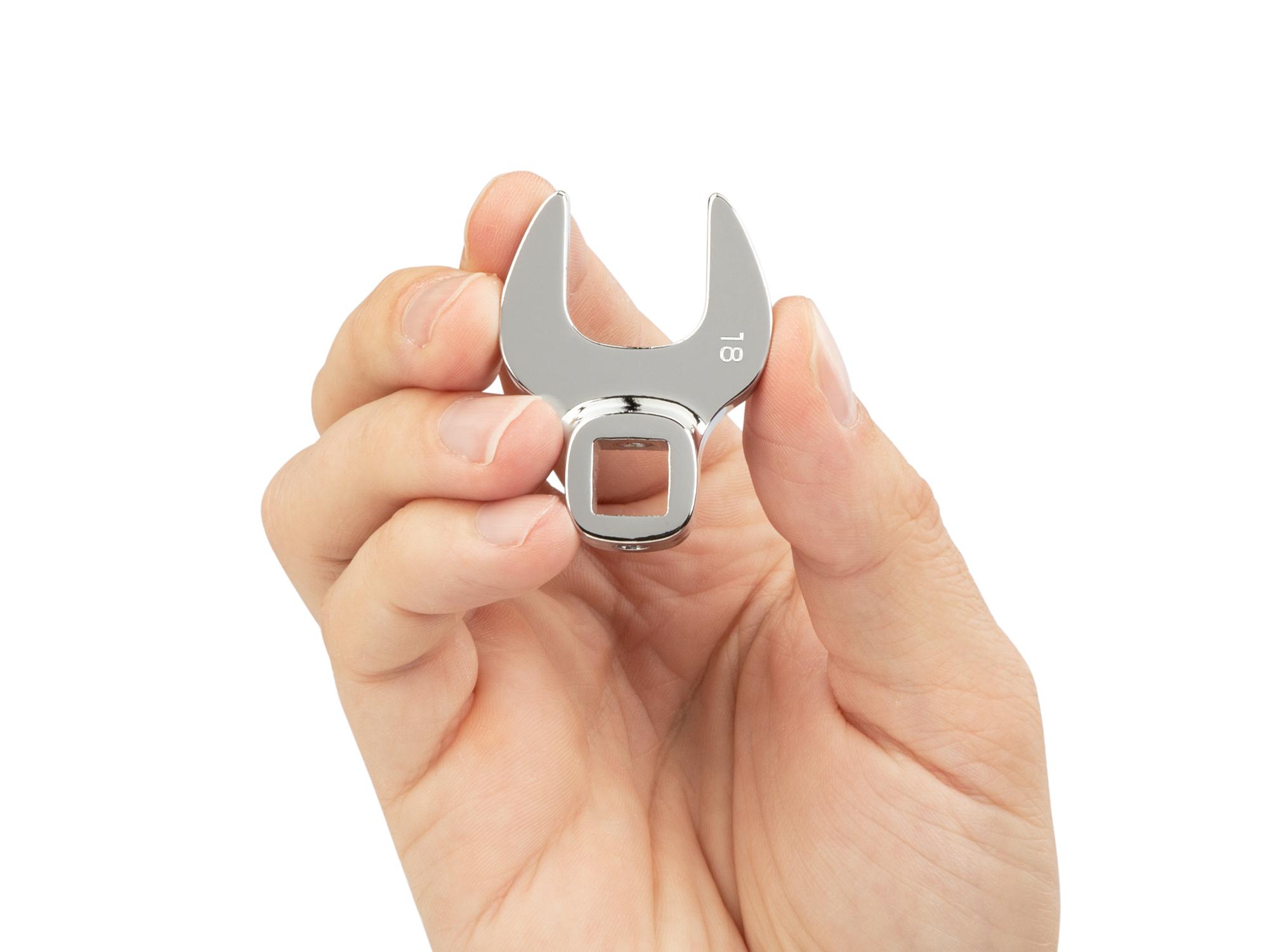 Person holding Tekton crowfoot wrench. Item #WCF14018