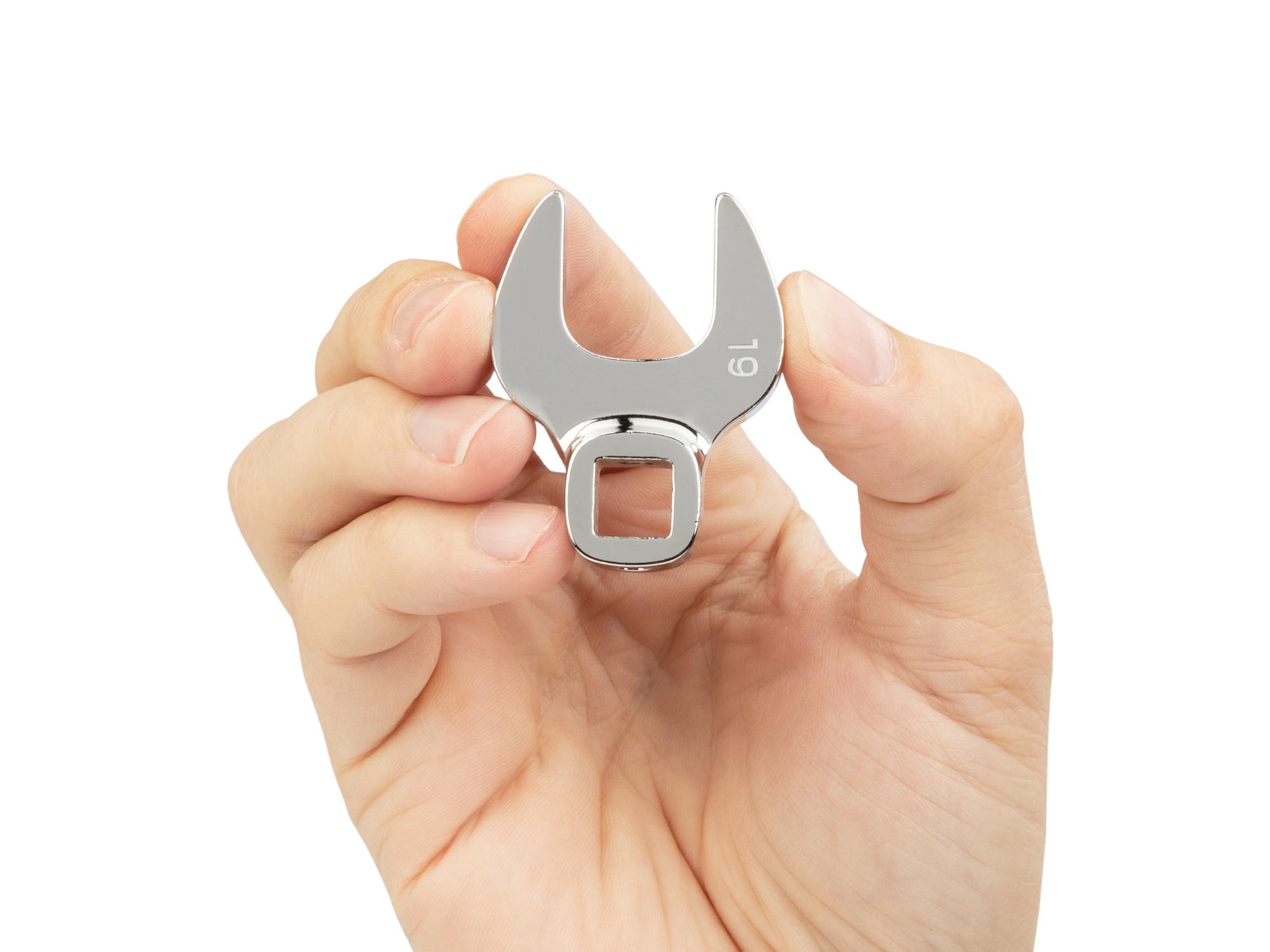 Person holding Tekton crowfoot wrench. Item #WCF14019