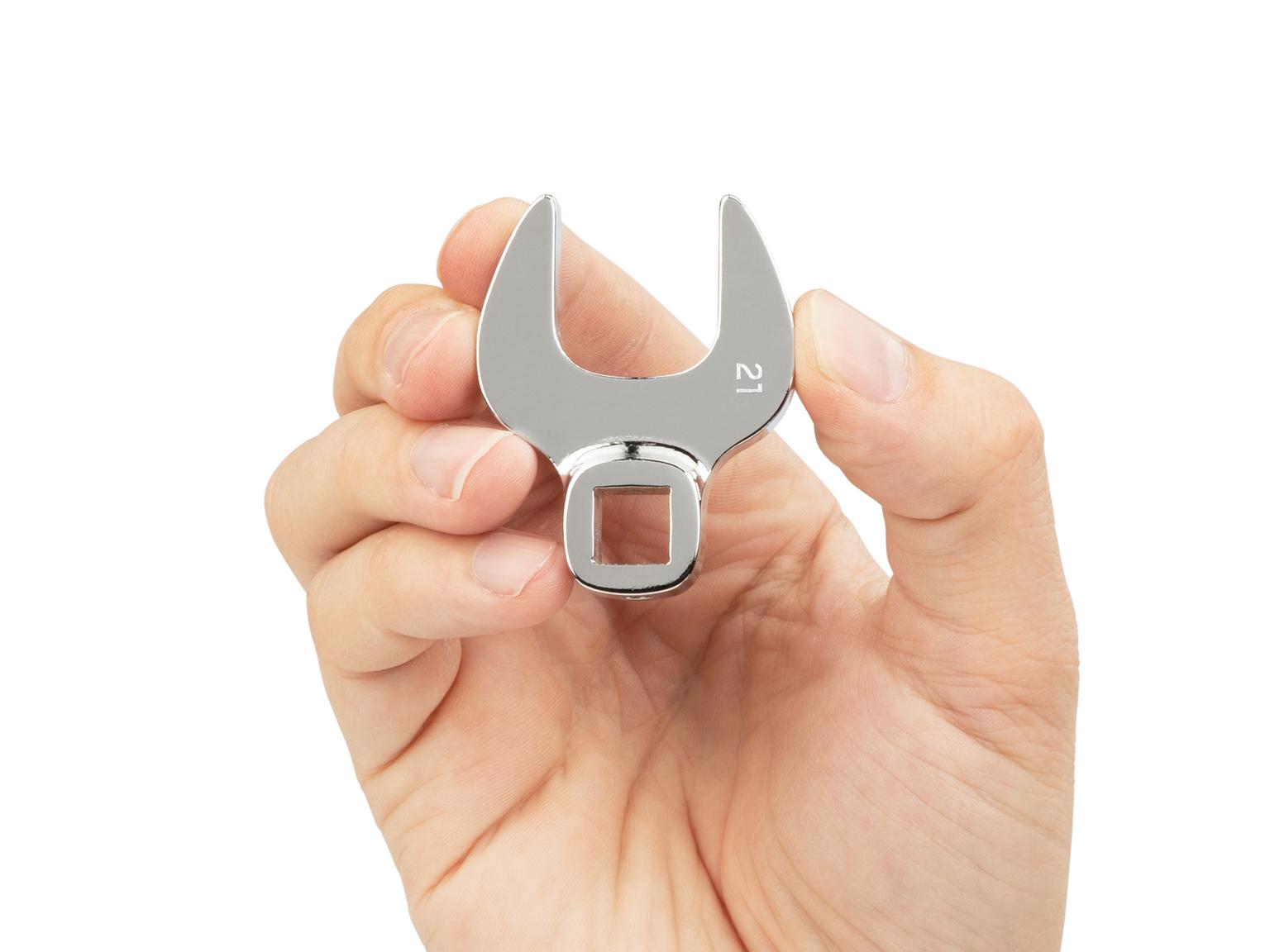 Person holding Tekton crowfoot wrench. Item #WCF14021