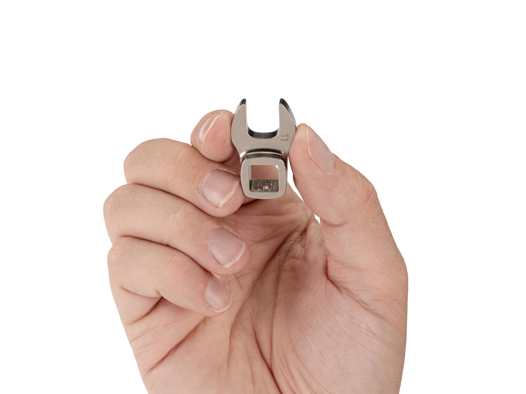 Person holding Tekton crowfoot wrench. Item #WCF14111