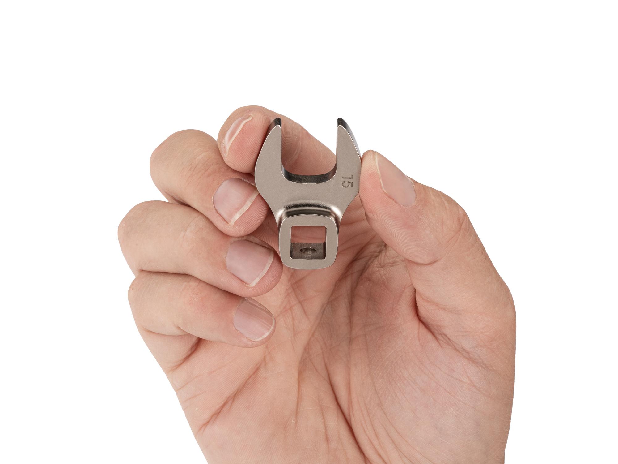 Person holding Tekton crowfoot wrench. Item #WCF14115