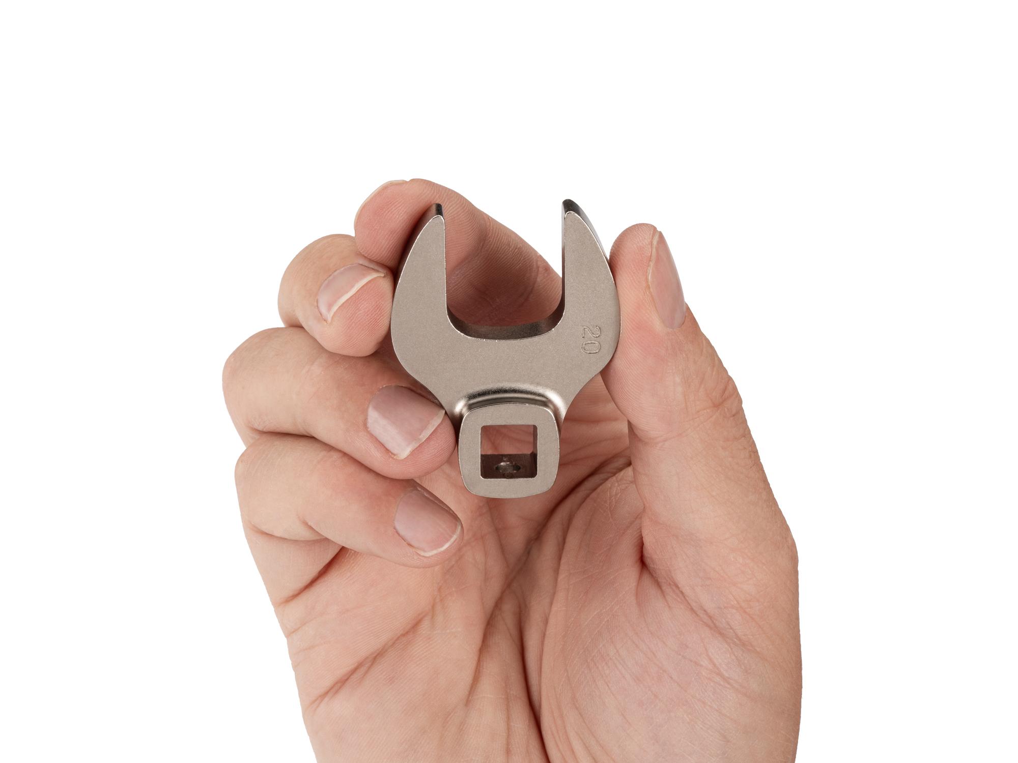 Person holding Tekton crowfoot wrench. Item #WCF14120