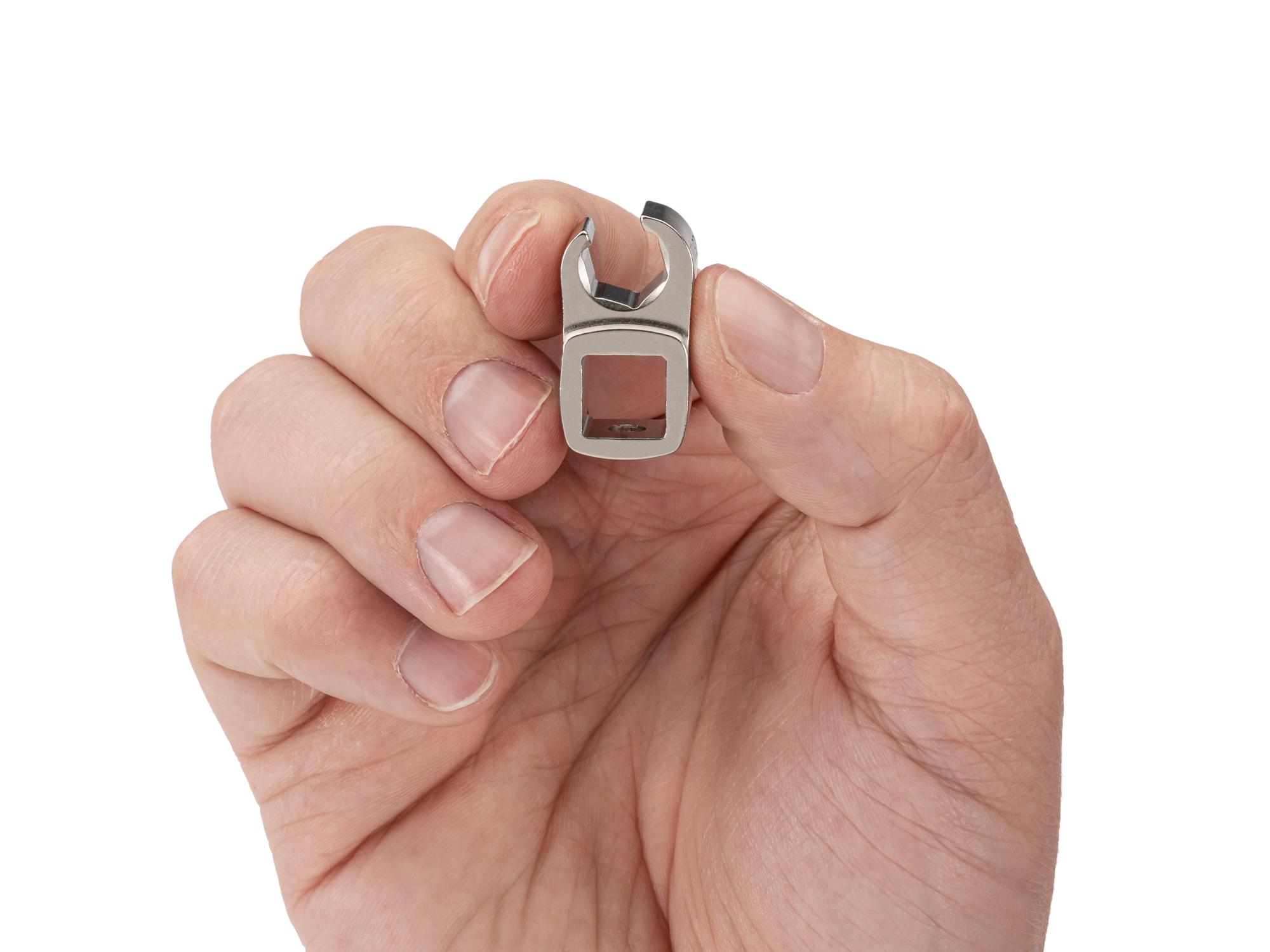 Person holding Tekton crowfoot wrench. Item #WCF15209