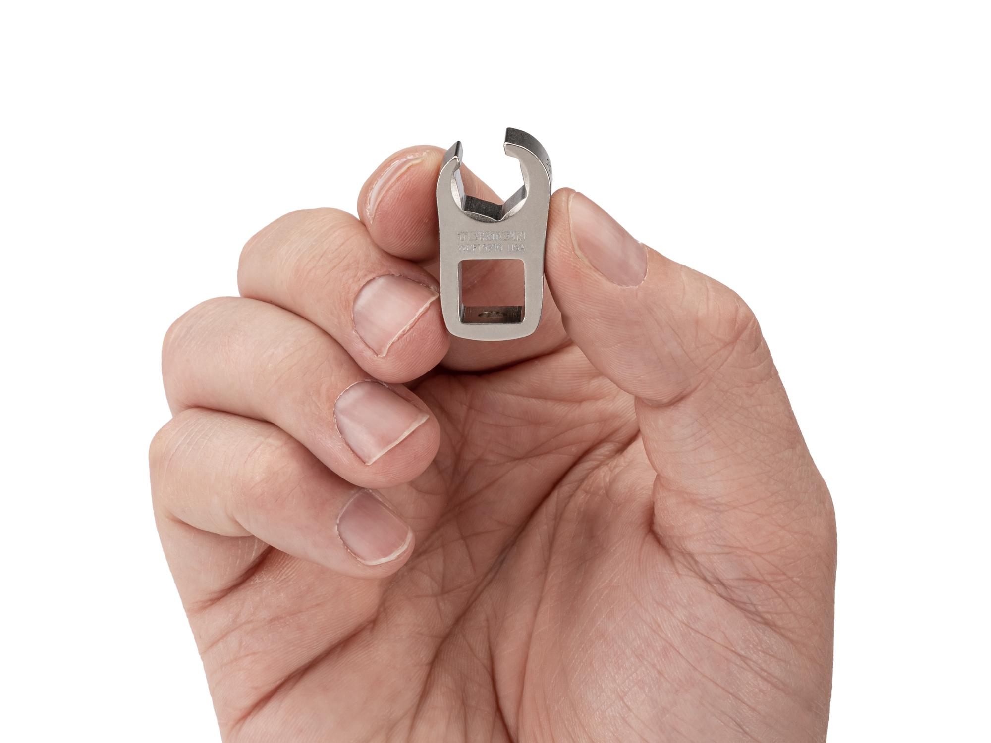 Person holding Tekton crowfoot wrench. Item #WCF15210