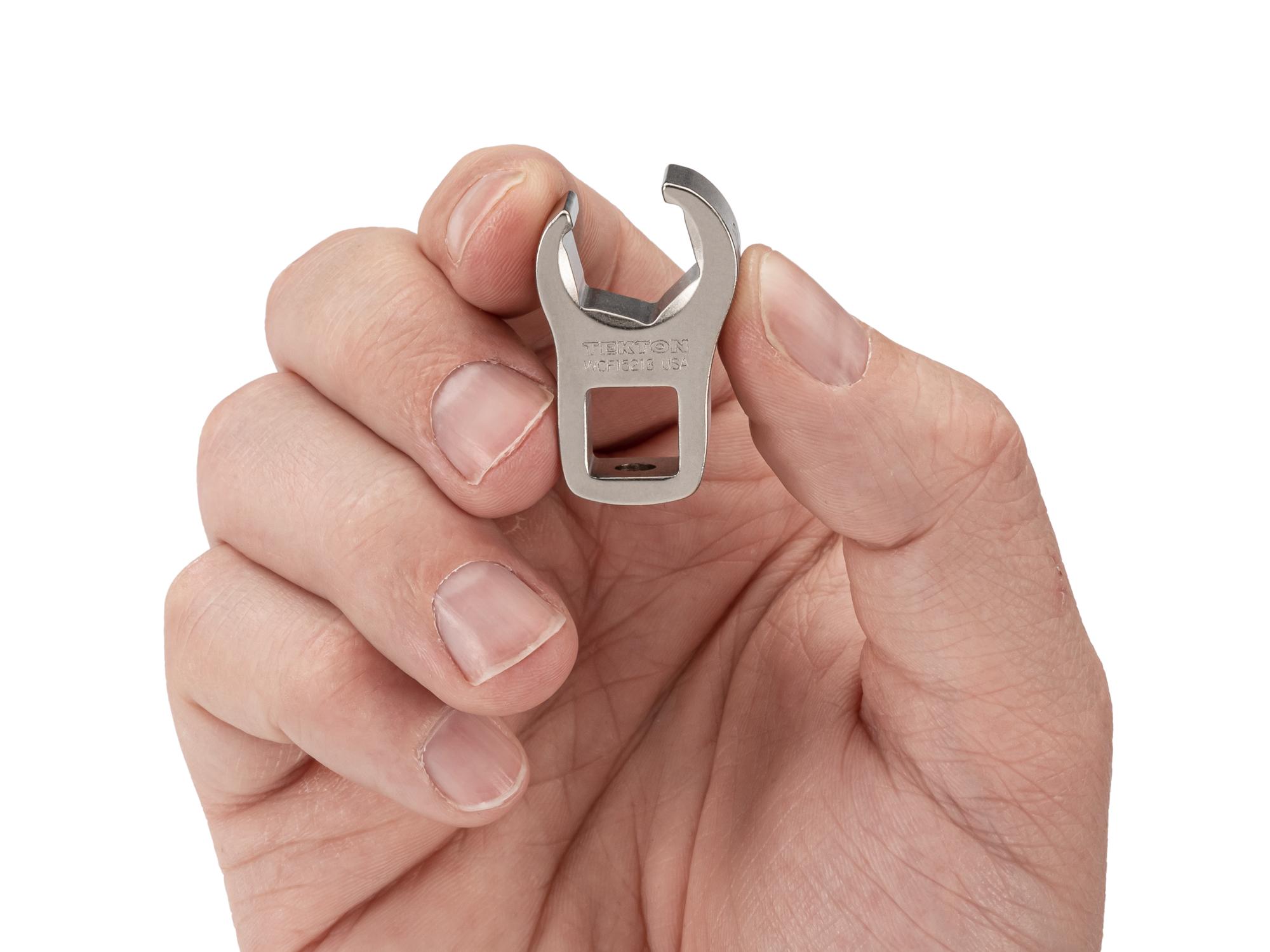 Person holding Tekton crowfoot wrench. Item #WCF15213