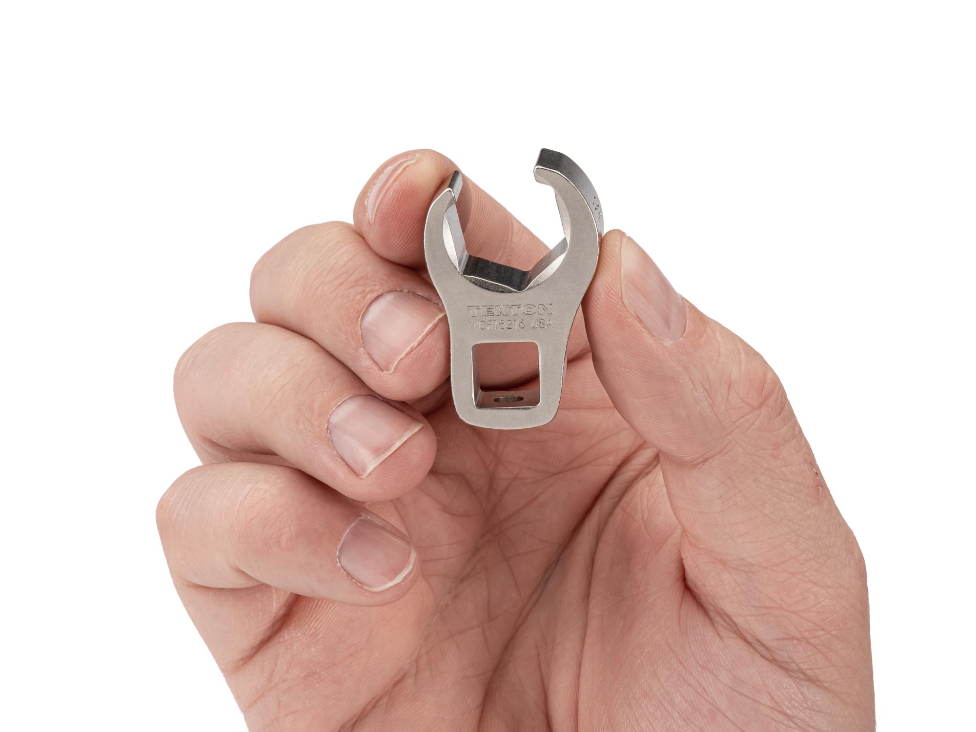Person holding Tekton crowfoot wrench. Item #WCF15216