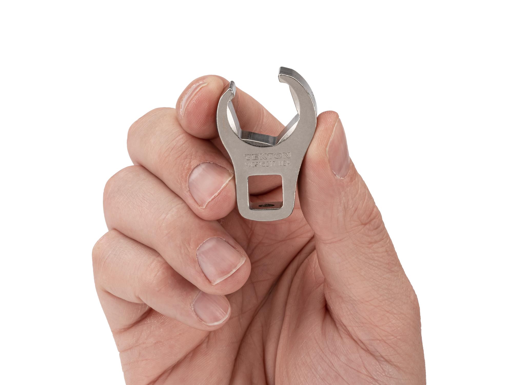 Person holding Tekton crowfoot wrench. Item #WCF15217