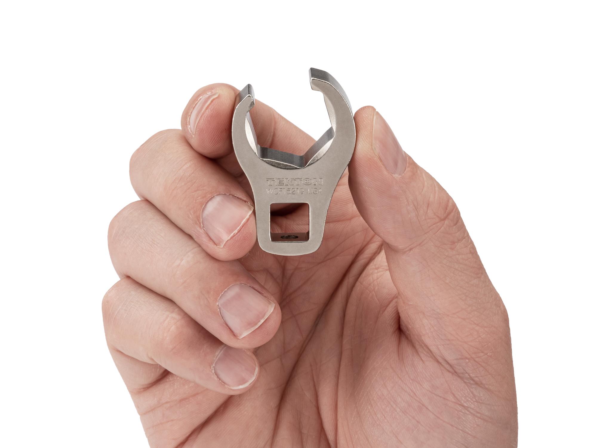 Person holding Tekton crowfoot wrench. Item #WCF15219