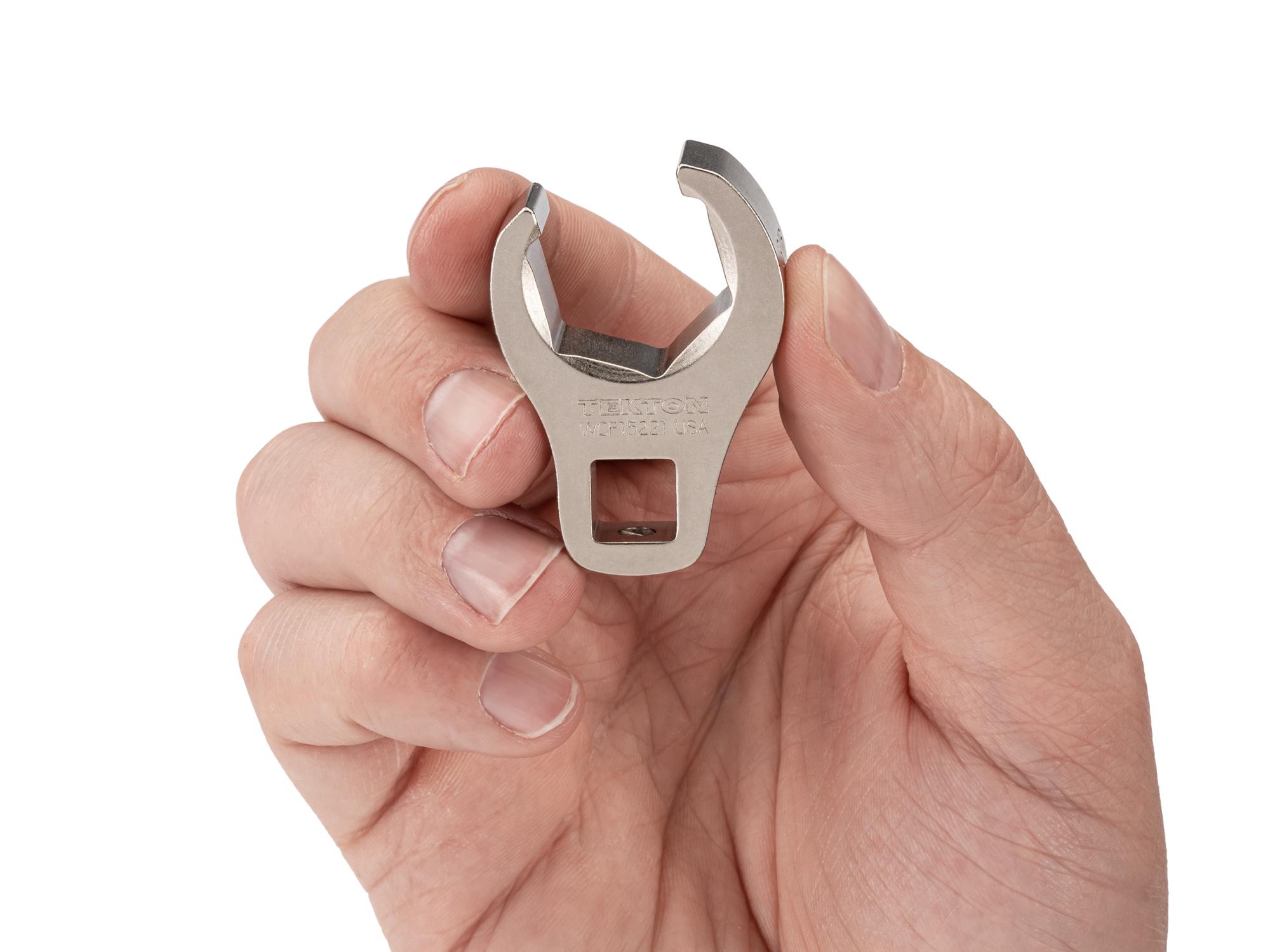 Person holding Tekton crowfoot wrench. Item #WCF15221