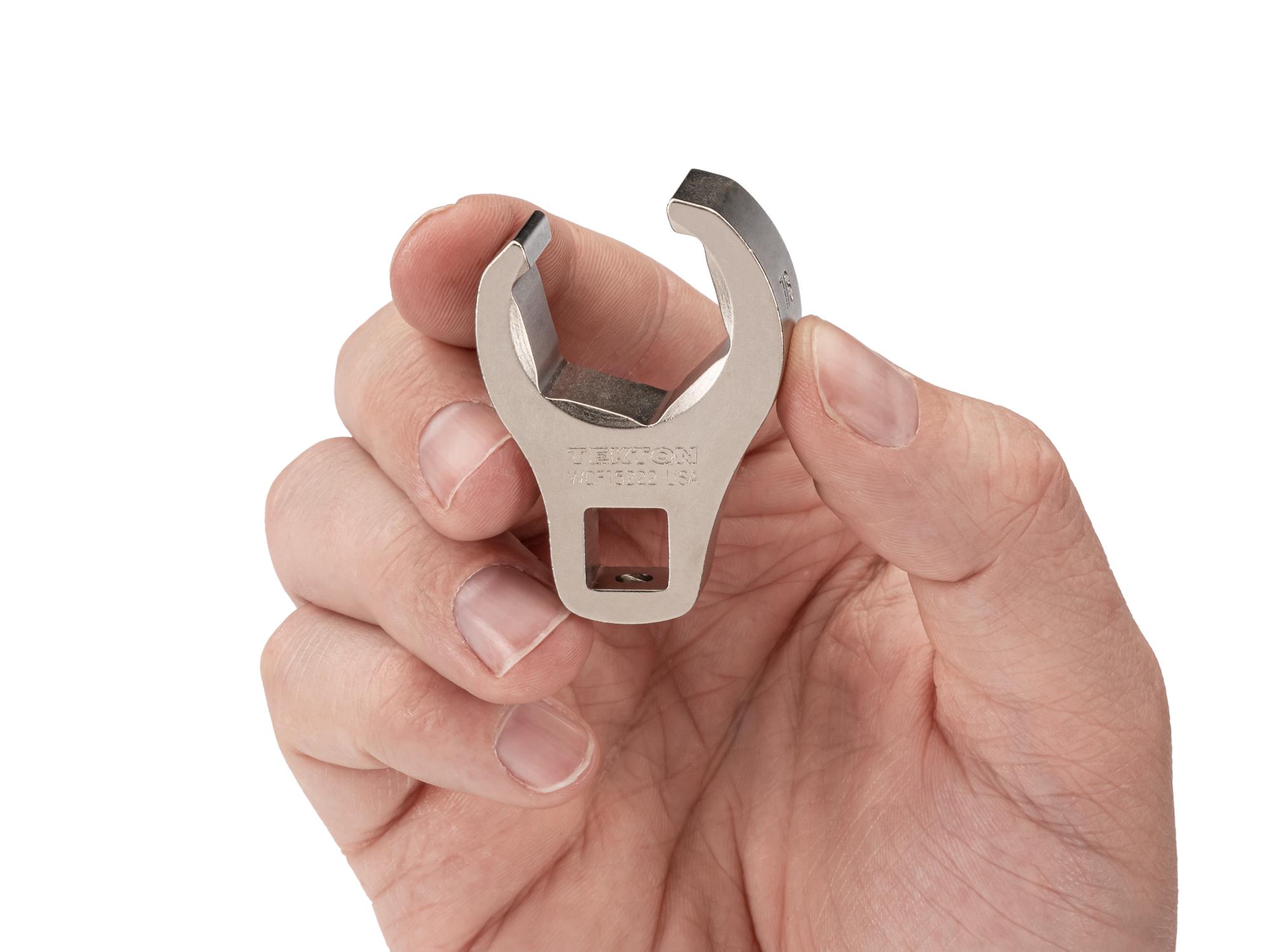 Person holding Tekton crowfoot wrench. Item #WCF15222
