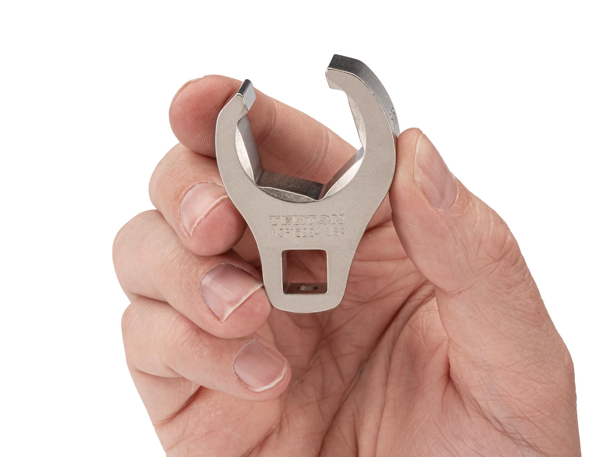 Person holding Tekton crowfoot wrench. Item #WCF15224
