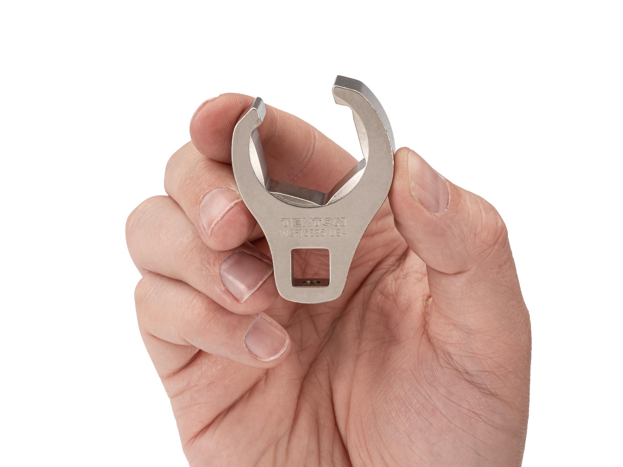 Person holding Tekton crowfoot wrench. Item #WCF15225