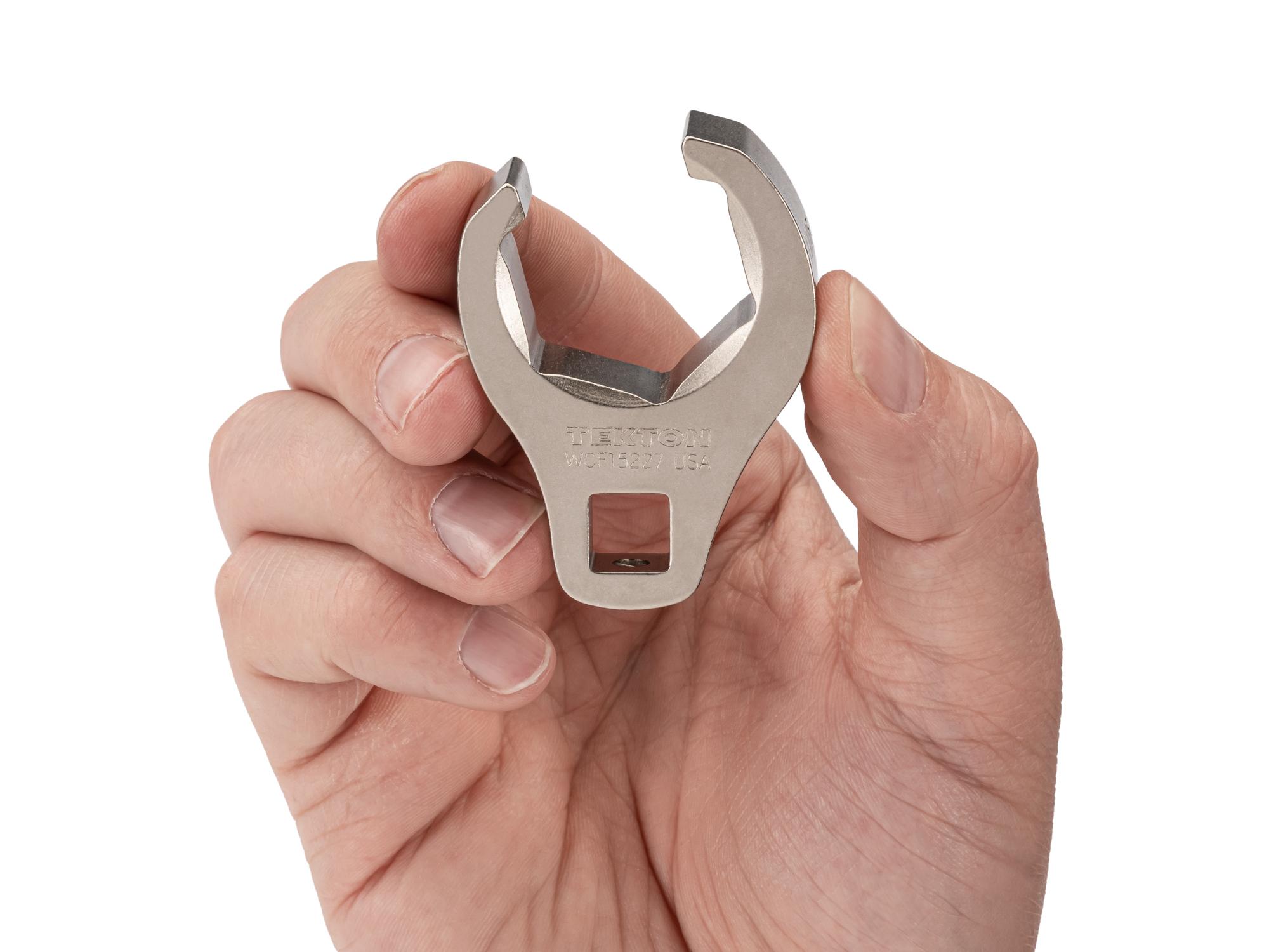 Person holding Tekton crowfoot wrench. Item #WCF15227