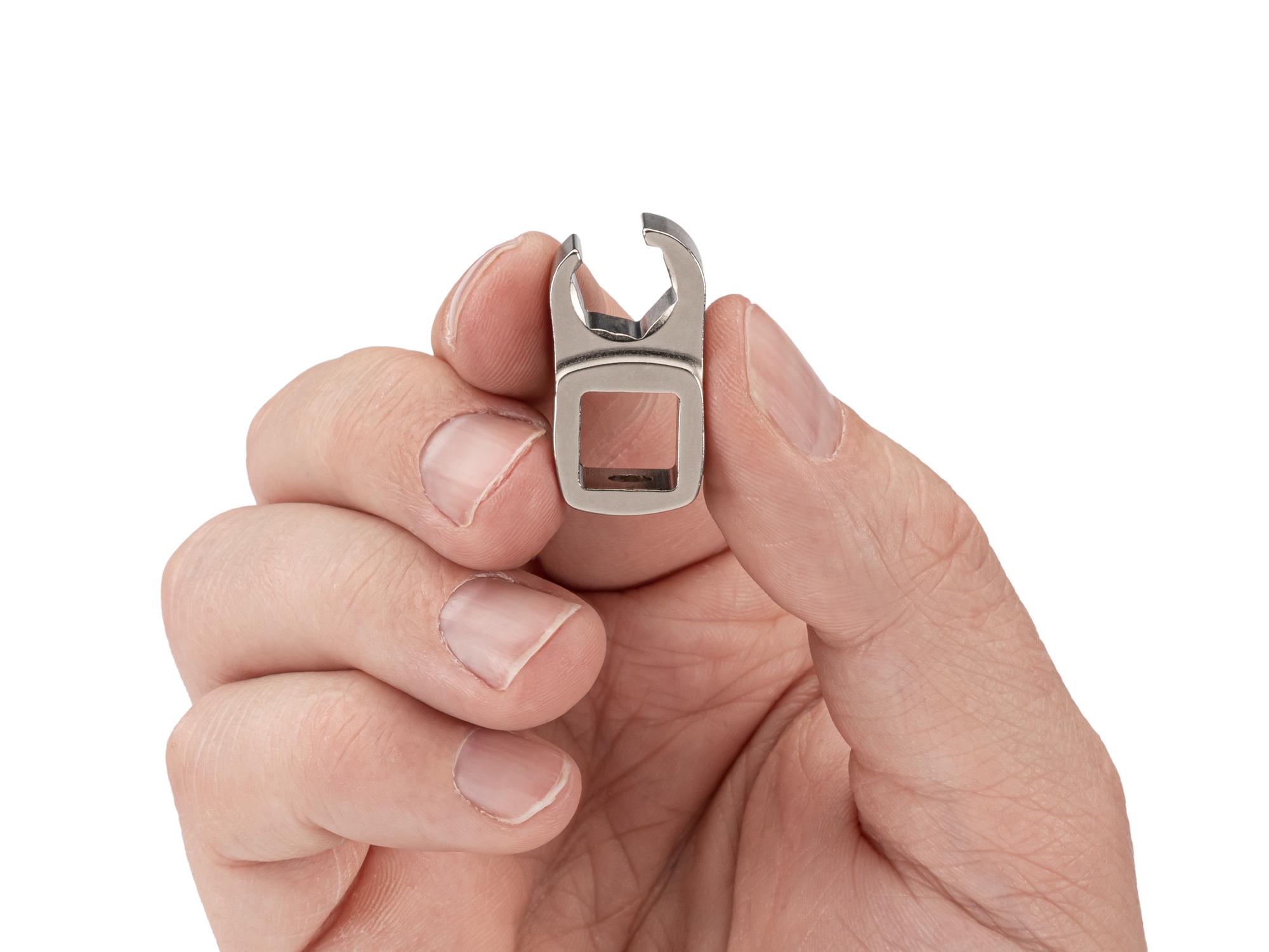 Person holding Tekton crowfoot wrench. Item #WCF16209