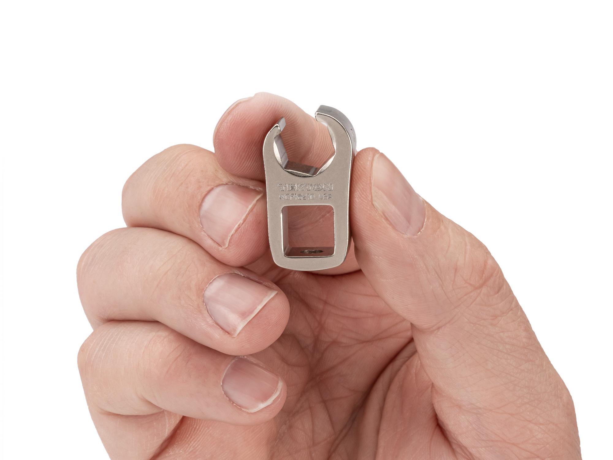 Person holding Tekton crowfoot wrench. Item #WCF16210