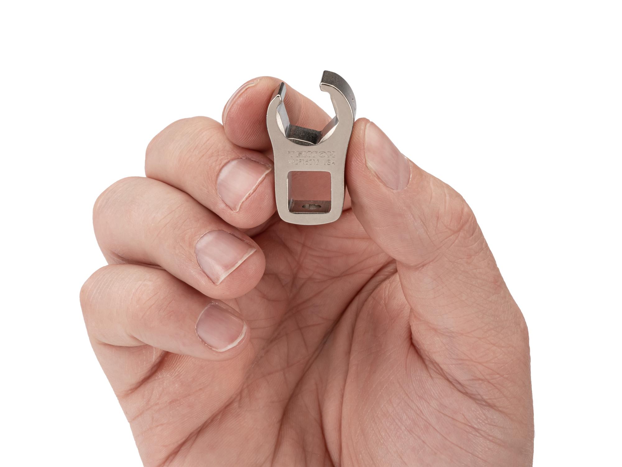 Person holding Tekton crowfoot wrench. Item #WCF16212