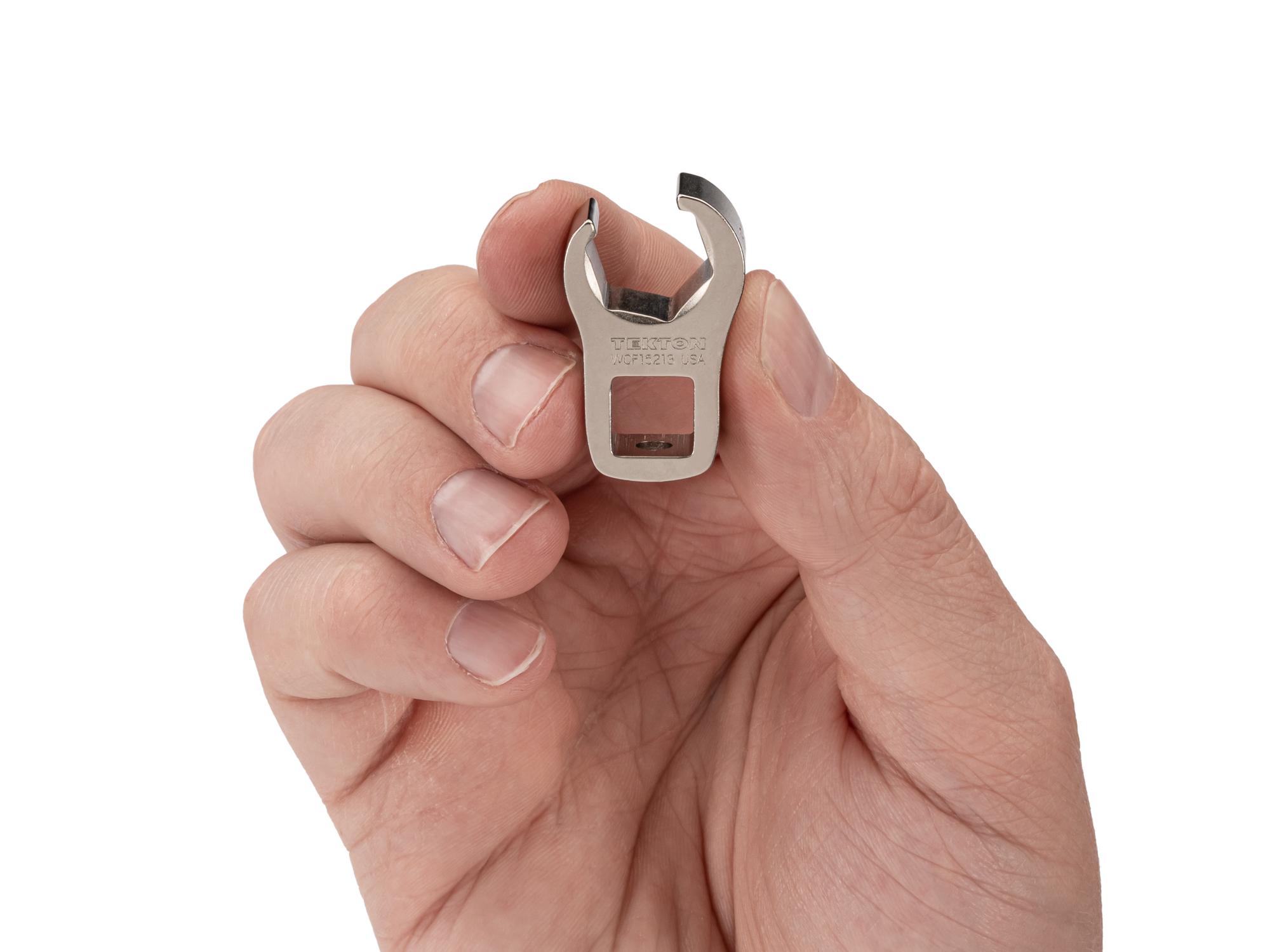 Person holding Tekton crowfoot wrench. Item #WCF16213