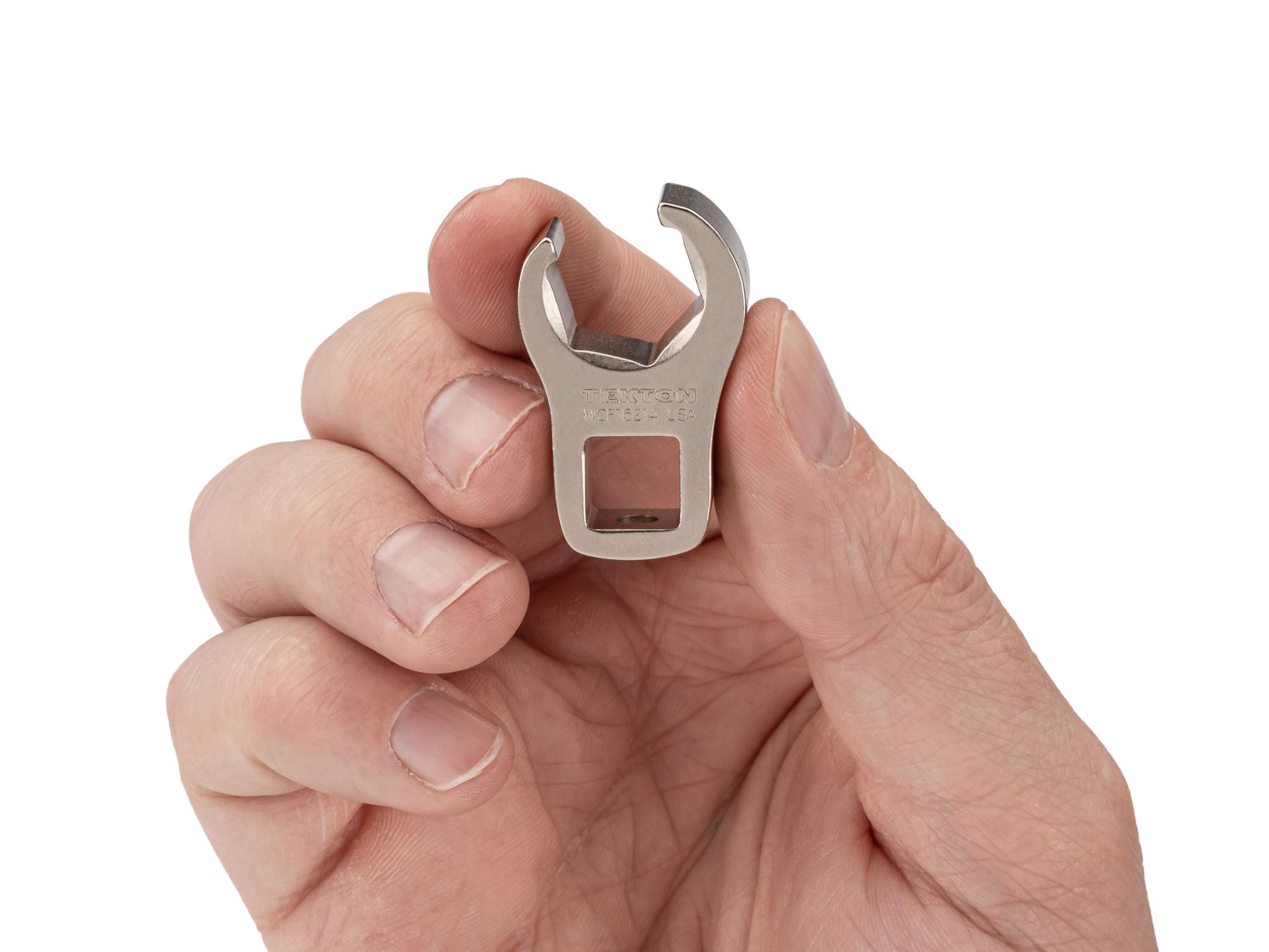 Person holding Tekton crowfoot wrench. Item #WCF16214