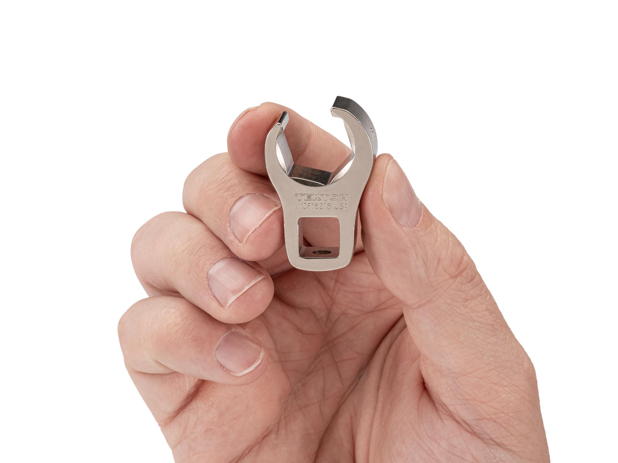 Person holding Tekton crowfoot wrench. Item #WCF16216