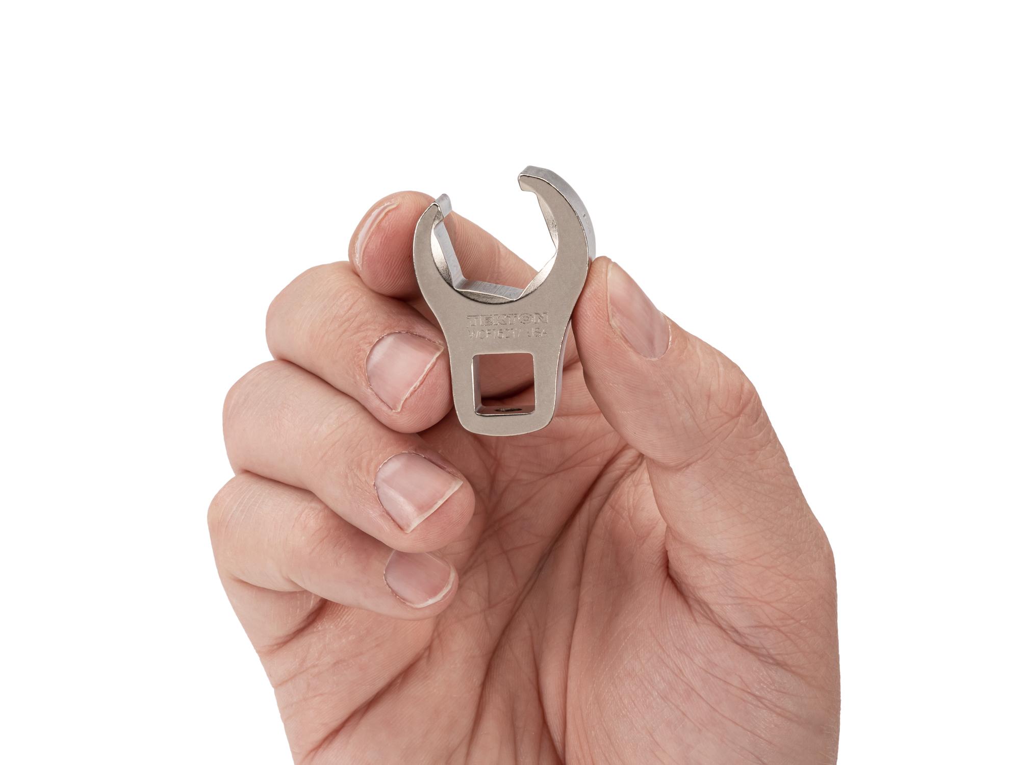 Person holding Tekton crowfoot wrench. Item #WCF16217