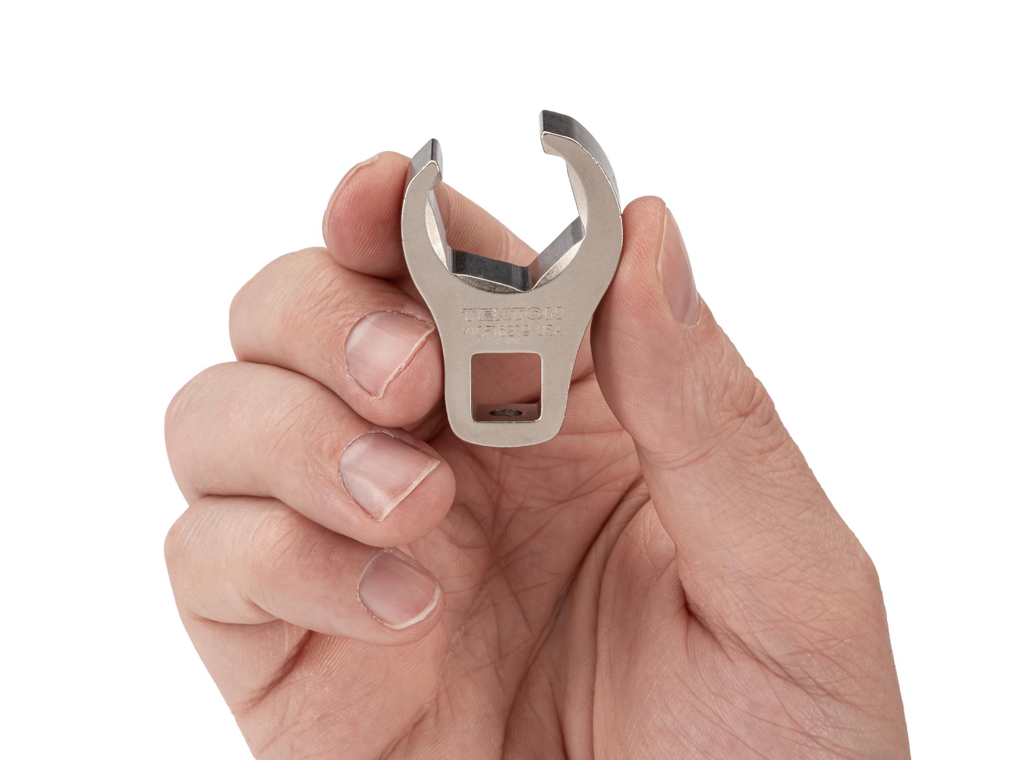 Person holding Tekton crowfoot wrench. Item #WCF16219