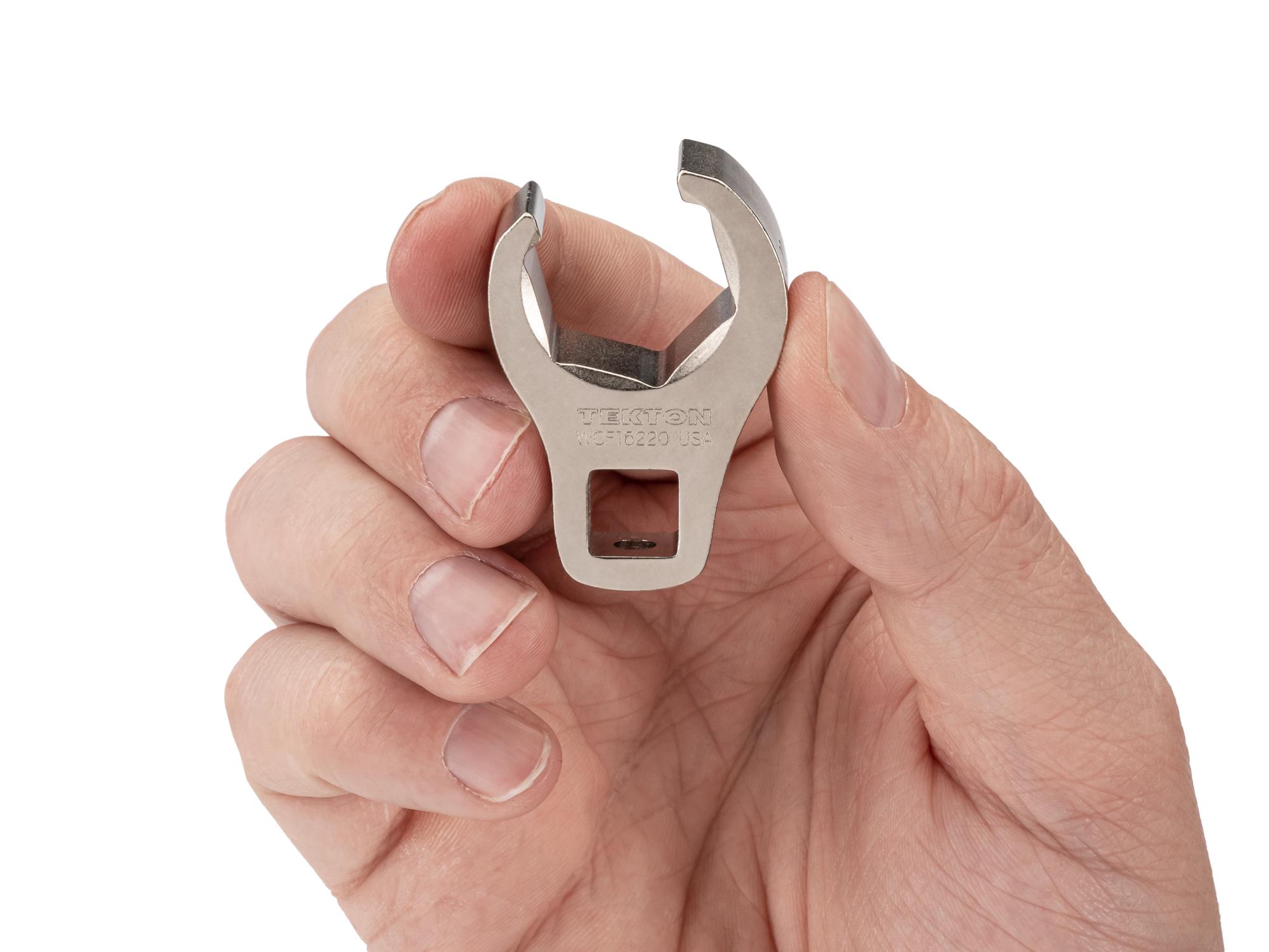 Person holding Tekton crowfoot wrench. Item #WCF16220