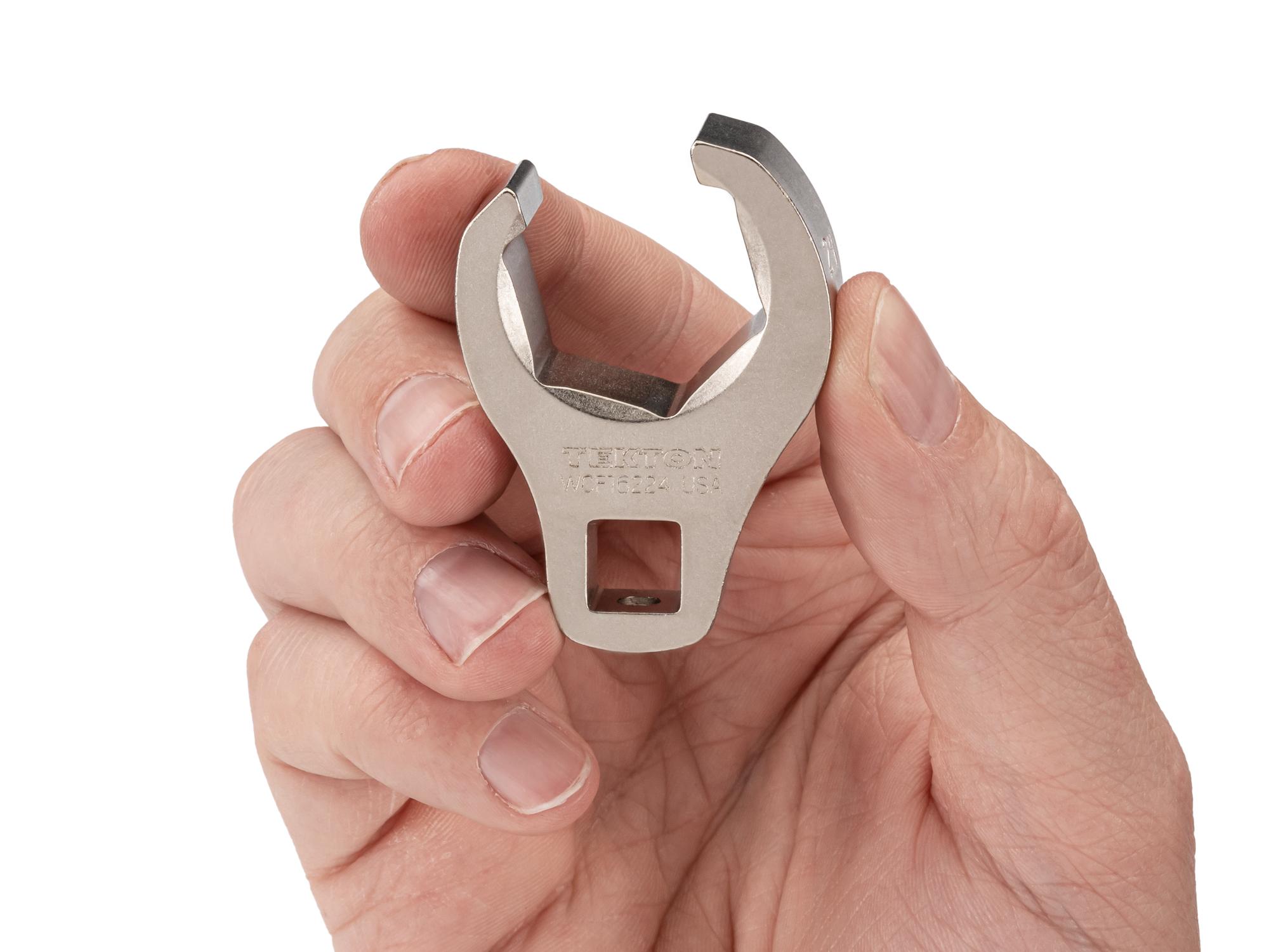 Person holding Tekton crowfoot wrench. Item #WCF16224