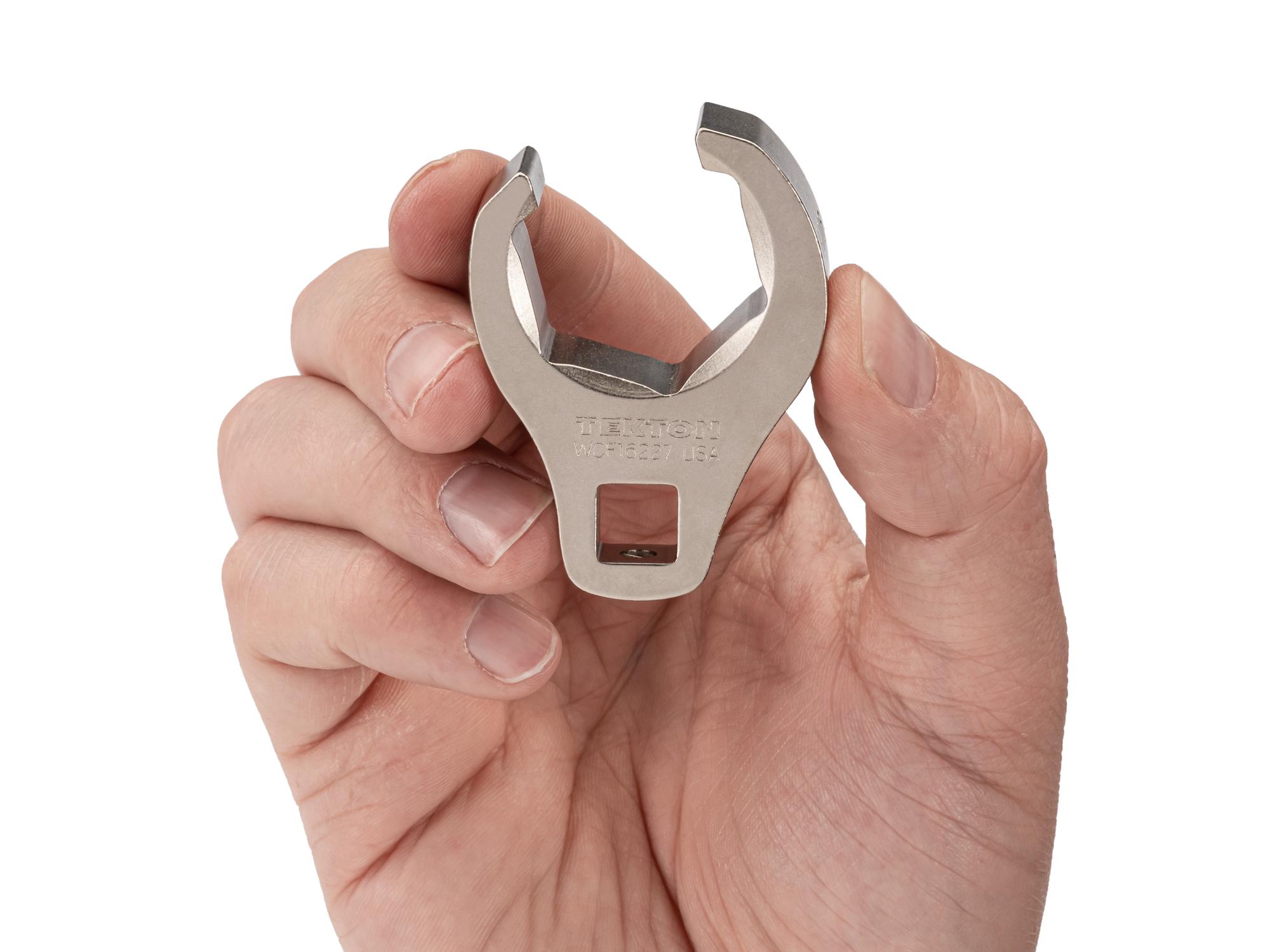 Person holding Tekton crowfoot wrench. Item #WCF16227