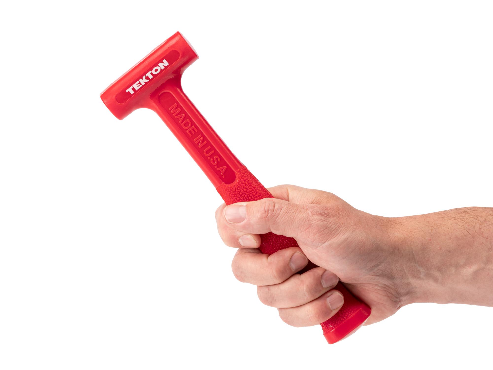 Person holding Tekton dead blow hammer. Item #HDB30008